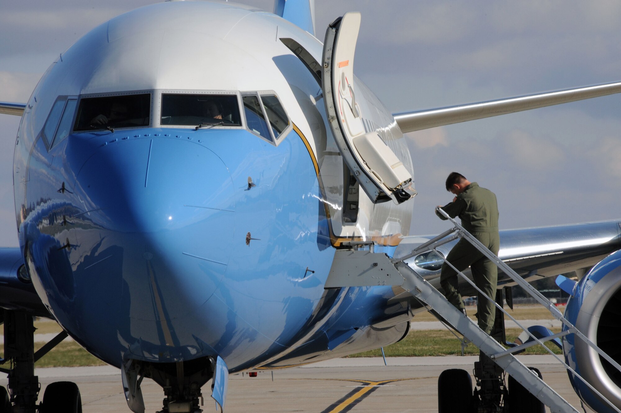 A 932nd Airlift Wing pilot checks his watch before a local training flight aboard the unit's C-40C aircraft.  (U.S. Air Force photo/Maj. Stan Paregien)
