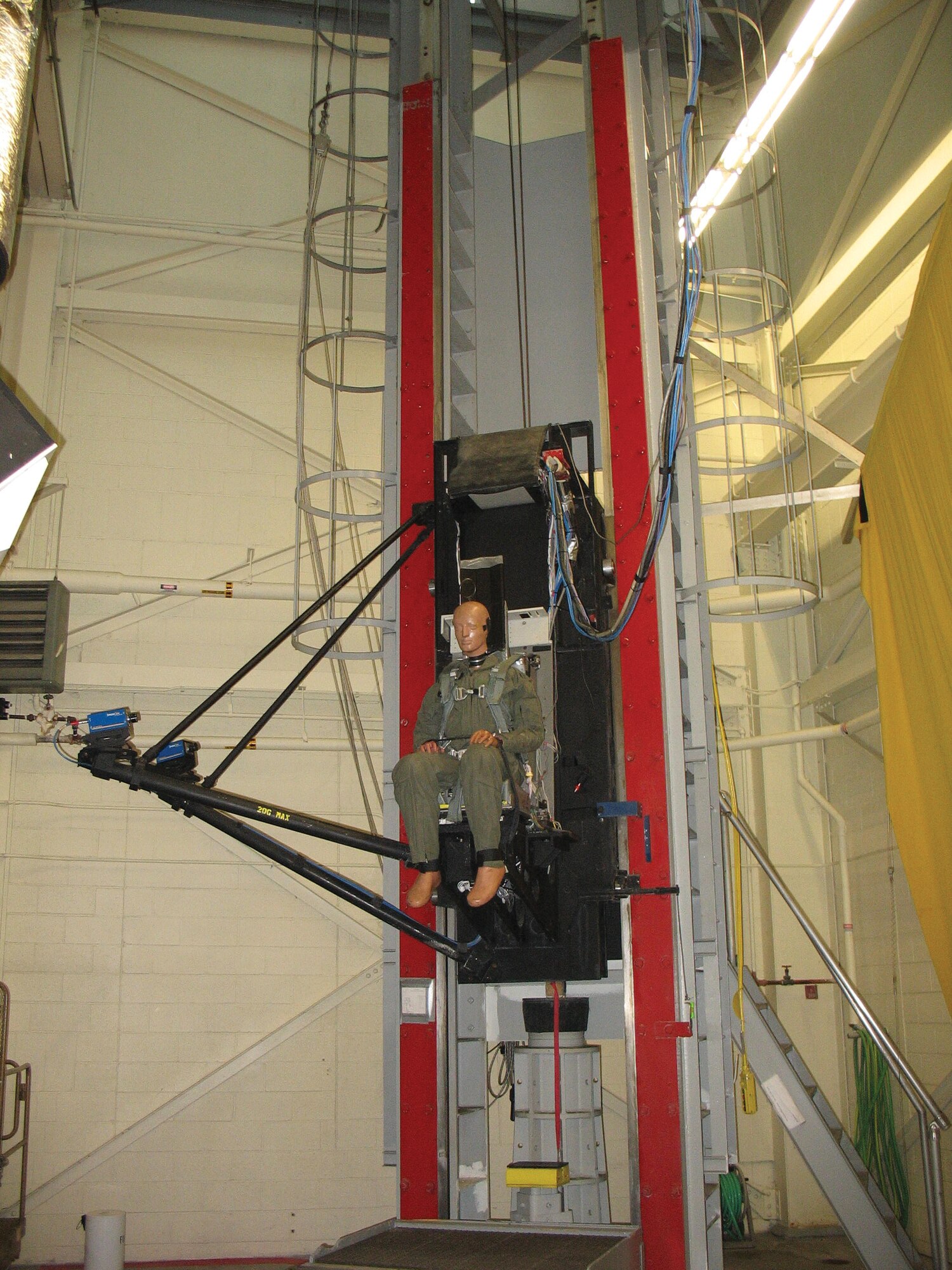A manikin fitted with a Joint Service Aircrew Mask and Joint Helmet-Mounted Cueing System facilitates AFRL's recent biodynamic evaluation of the protective equipment in terms of pilot neck loads. (Air Force image)