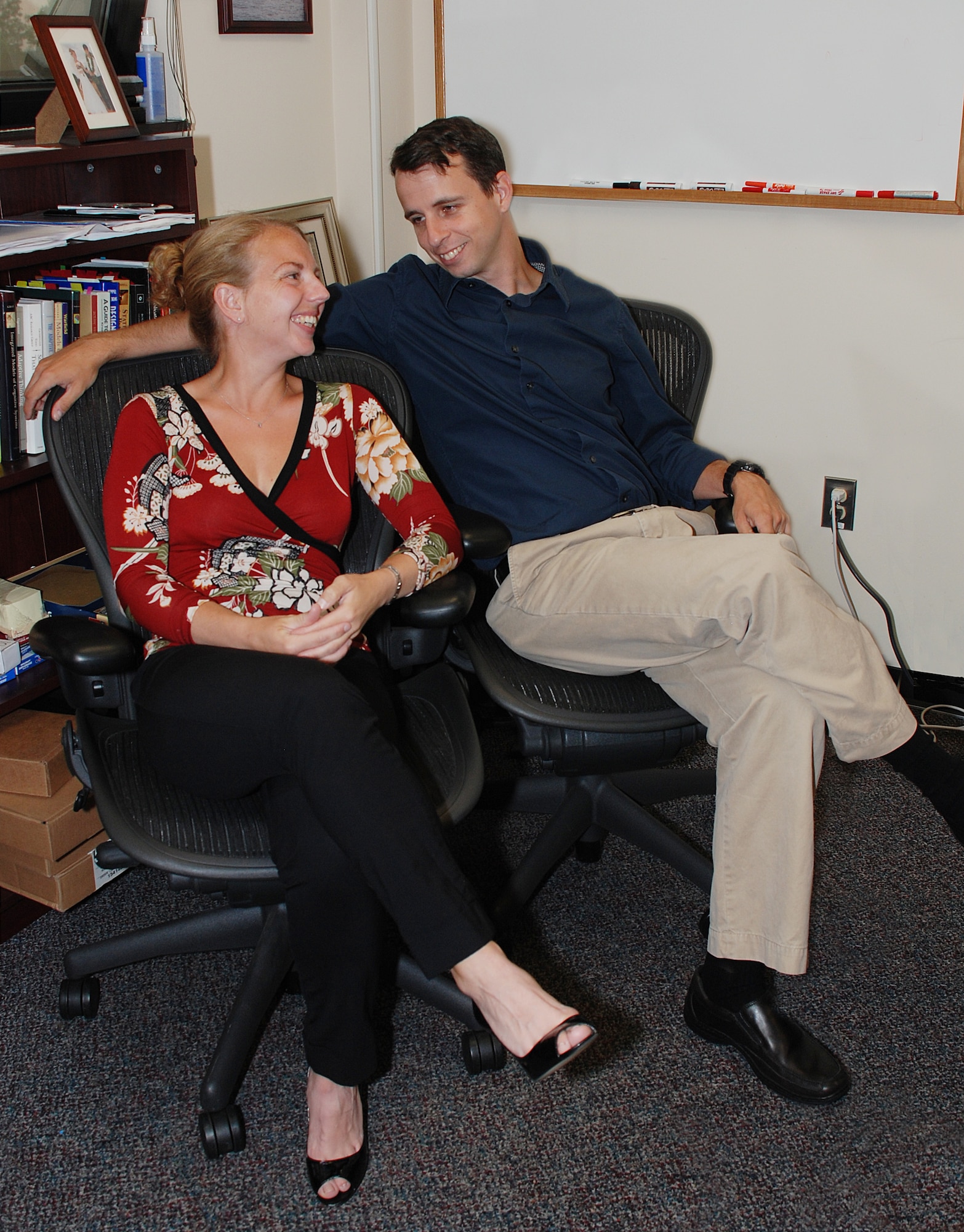 Dr. Tiffany Jastrzembski and Dr. Chris Myers, cognitive scientists with the 711th Human Performance Wing, Human Effectiveness Directorate, Warfighter Readiness Research Division, Cognitive Models & Agents Branch, relocated to Wright-Patterson Air Force Base, Ohio from Mesa, Ariz. Their jobs were moved to WPAFB as part of the Base Realignment and Closure (BRAC) directives. (Photo by Chris Gulliford, 711 HPW)