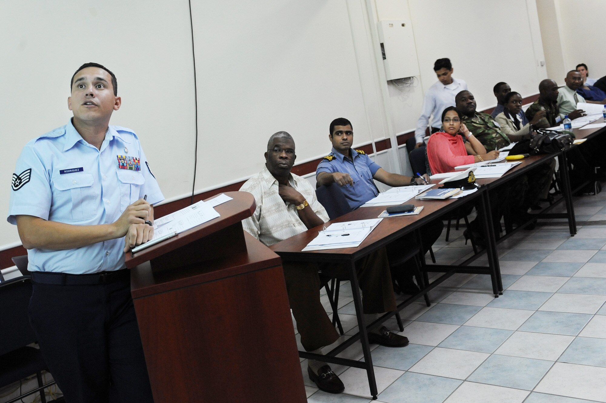 Staff Sgt. Abraham Rodriguez teaches a disaster planning and mass casualty response class for primary care providers July 21, 2010, in Port of Spain, Trinidad and Tobago. Sergeant Rodriguez is the NCO in charge of the Defense Institute for Medical Operations, United States Air Force School of Aerospace Medicine, at Brooks City-Base, Texas. (U.S. Air Force photo/Staff Sgt. Desiree N. Palacios)