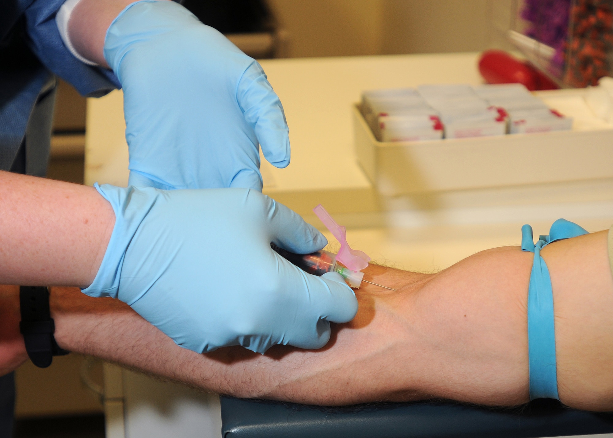 Staff Sgt. Heather Whitted, 31st Medical Support Squadron laboratory technician, draws blood from a patient July 20 at the medical laboratory.  Drawing blood is preformed to collect blood samples for compete blood count and chemistry tests.  (U.S. Air Force photo/Senior Airman Tabitha M. Lee)