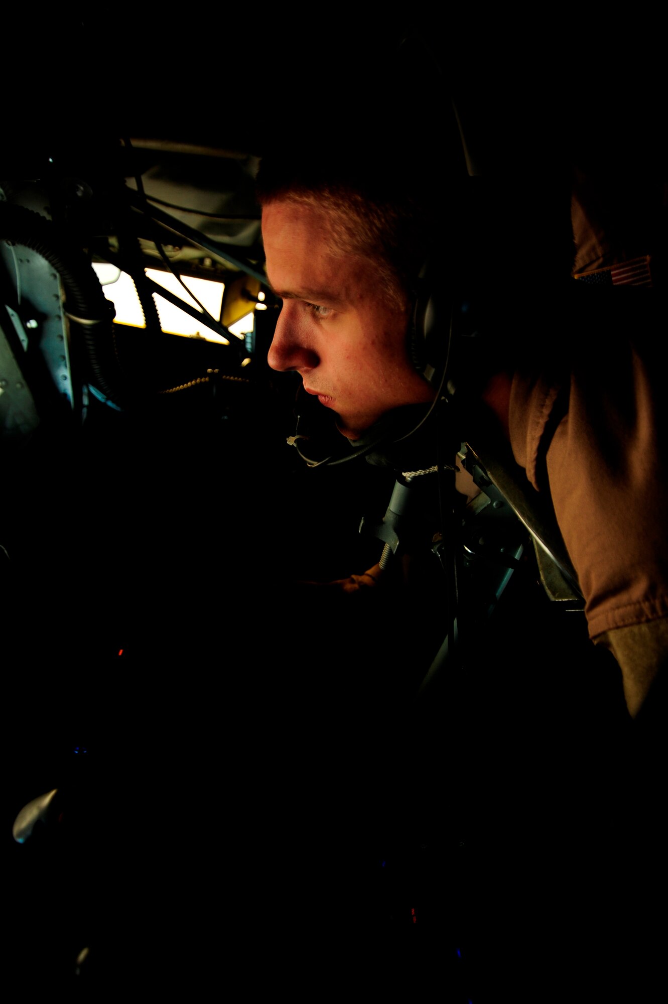 U.S. Air Force Senior Airman Andrew Kueffler, a KC-135 Stratotanker boom operator assigned to the 340th Expeditionary Air Refueling Squadron, positions refueling pods to refuel a U.S. Marine Corps F-18 Hornet over Afghanistan while deployed to a base in Southwest Asia on July 8, 2010. Coalition tankers have flown greater than 6,000 sorties, offloaded greater than 400 million pounds of fuel and refueled nearly 33,000 aircraft as of June 30, 2010. (U.S. Air Force photo by Staff Sgt. Andy M. Kin / Released)