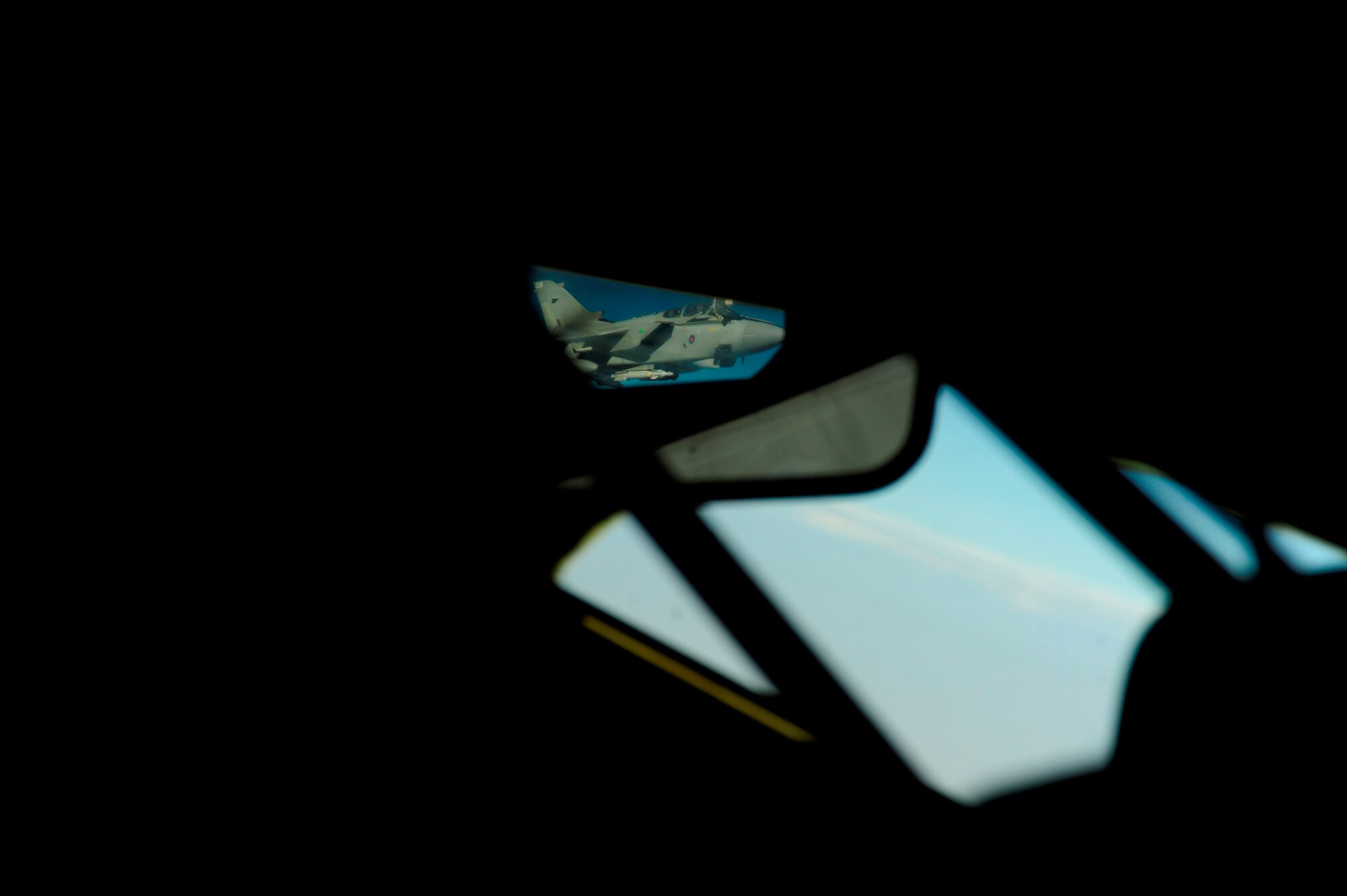 A U.S. Marine Corps F-18 Hornet refuels with a KC-135 Stratotanker assigned to the 340th Expeditionary Air Refueling Squadron over Afghanistan on July 8, 2010. The 340th EARS is deployed to a base in Southwest Asia. Coalition tankers have flown greater than 6,000 sorties, offloaded greater than 400 million pounds of fuel and refueled nearly 33,000 aircraft as of June 30, 2010. (U.S. Air Force photo by Staff Sgt. Andy M. Kin / Released)