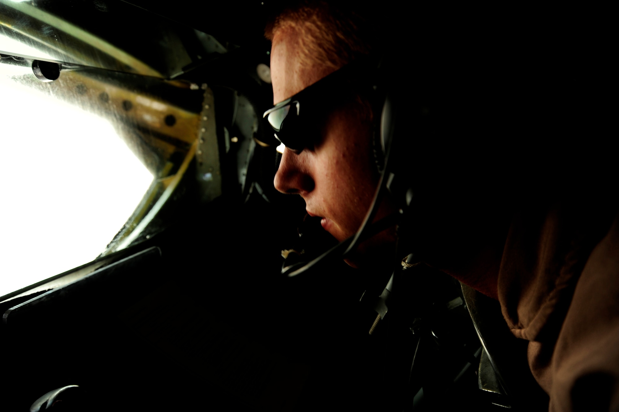 U.S. Air Force Senior Airman Andrew Kueffler, a KC-135 Stratotanker boom operator assigned to the 340th Expeditionary Air Refueling Squadron, refuels a U.S. Marine Corps F-18 Hornet over Afghanistan while deployed to a base in Southwest Asia on July 8, 2010. Coalition tankers have flown greater than 6,000 sorties, offloaded greater than 400 million pounds of fuel and refueled nearly 33,000 aircraft as of June 30, 2010. (U.S. Air Force photo by Staff Sgt. Andy M. Kin / Released)