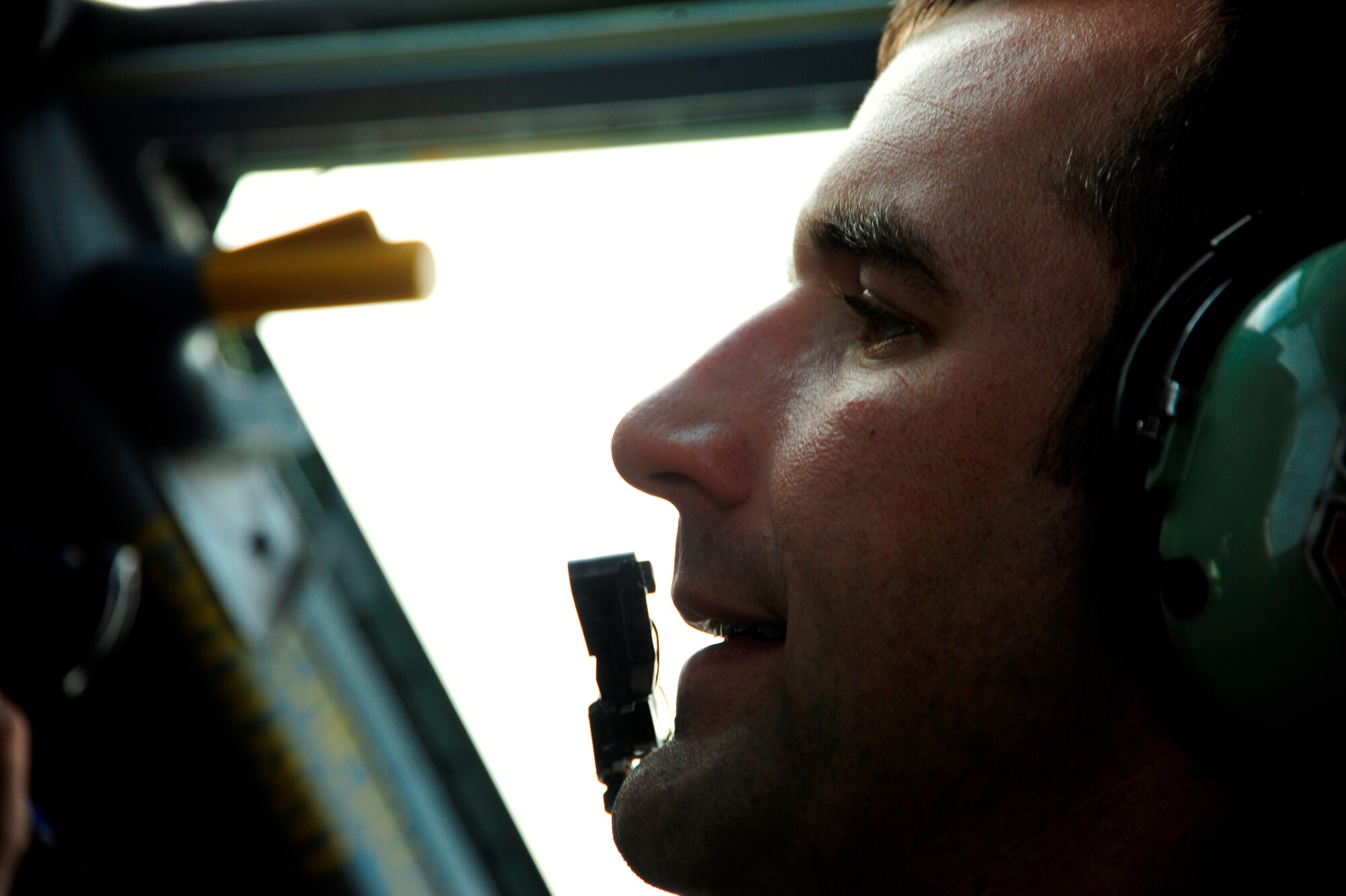 U.S. Air Force Capt. Nicholas Williams, a KC-135 Stratotanker pilot assigned to the 340th Expeditionary Air Refueling Squadron, calls the air traffic control tower before departing on a flying mission over Afghanistan while deployed to a base in Southwest Asia on July 8, 2010. Coalition tankers have flown greater than 6,000 sorties, offloaded greater than 400 million pounds of fuel and refueled nearly 33,000 aircraft as of June 30, 2010. (U.S. Air Force photo by Staff Sgt. Andy M. Kin / Released)