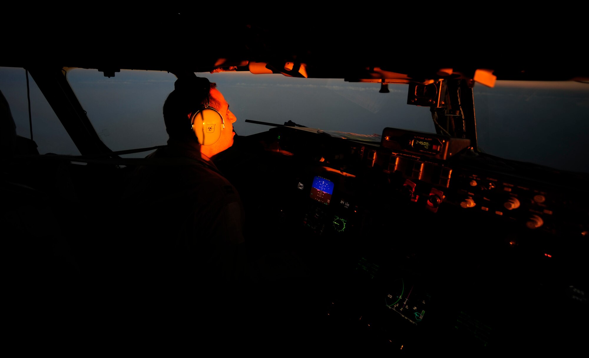 U.S. Air Force Capt. Adam Kornitzer, a KC-135 Stratotanker pilot assigned to the 340th Expeditionary Air Refueling Squadron, flies over Afghanistan during an air refueling mission of a U.S. Marine Corps F-18 Hornet on July 8, 2010. Coalition tankers have flown greater than 6,000 sorties, offloaded greater than 400 million pounds of fuel and refueled nearly 33,000 aircraft as of June 30, 2010. (U.S. Air Force photo by Staff Sgt. Andy M. Kin / Released)