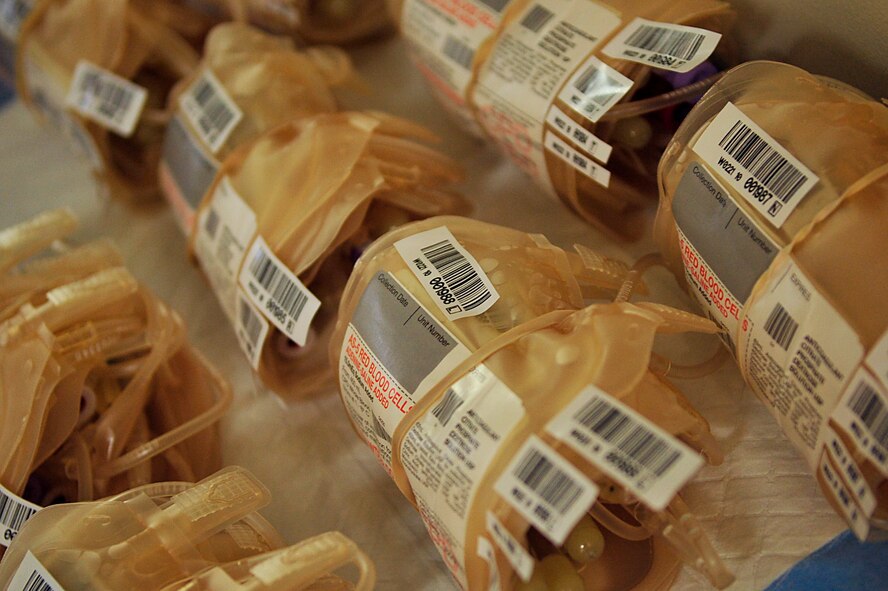 Blood bags are banded together and laid out waiting to be taken by their respective owner to be filled with healthy blood from the Airmen of the First Term Airman Center on Kadena Air Base July 21. As a joint operation among the military services, the Armed Services Blood Program has many components working together to collect, process, store, distribute, and transfer blood worldwide.  (U.S. Air Force photo / Senior Airman Amanda Grabiec)