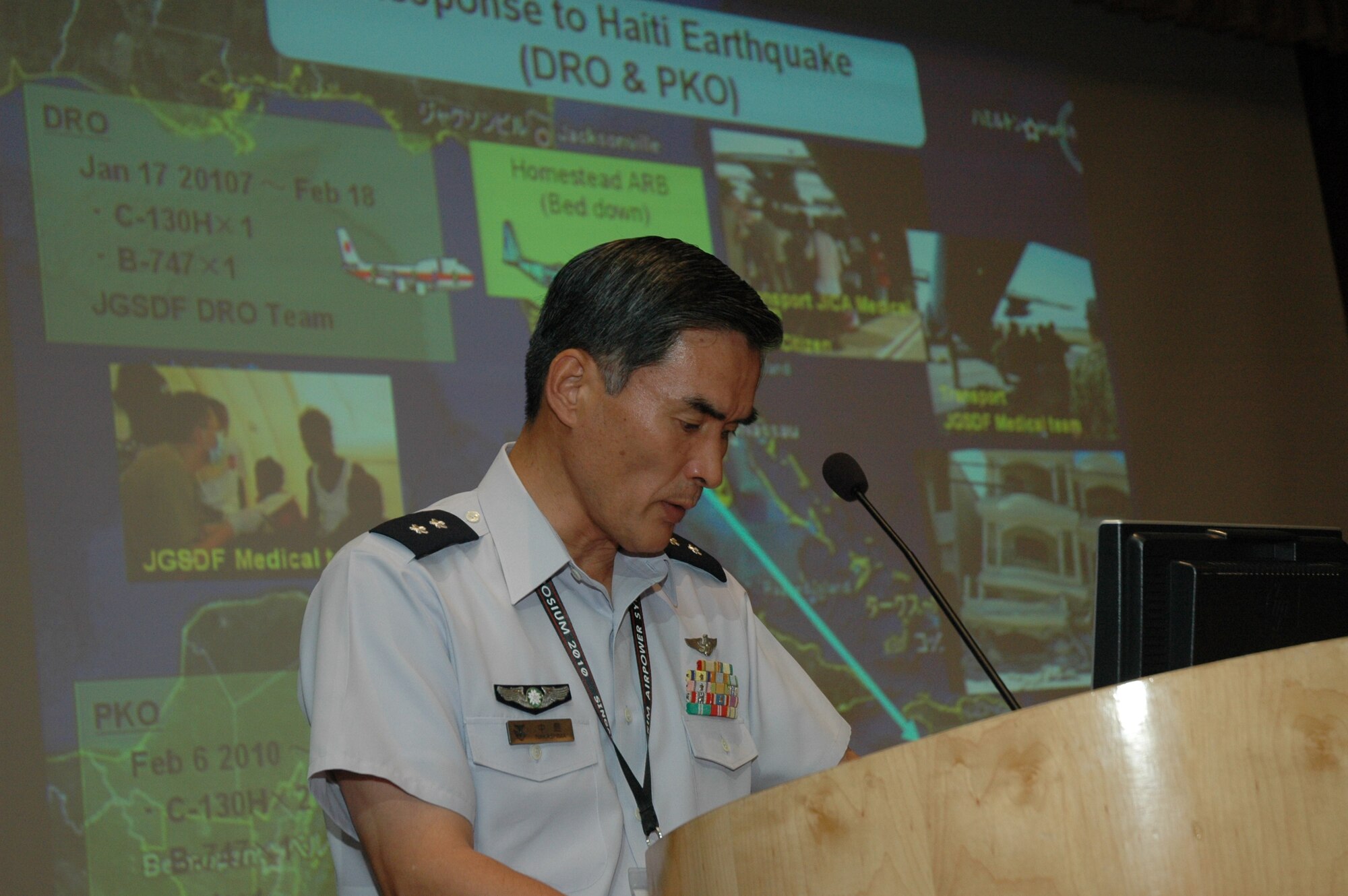 Major General Kunisuke Nakashima, Japan Air Self Defense Force, talks about his country’s support to relief operations following the earthquake that devastated Haiti last January.  The presentation was part of the 2010 Pacific Rim Airpower Symposium, co-hosted this year by the Singapore Air Force and the U.S. Air Force.  The annual symposium encourages relationship building and enhances cooperation among the air forces of Asia-Pacific nations. This year's symposium theme, “The Role of Airpower in Peace Support Operations,” aims to help participants from 24 nations better understand how air forces can support peace-keeping missions in the region.  (Courtesy photo by Joshua Lok, Singapore Air Force)