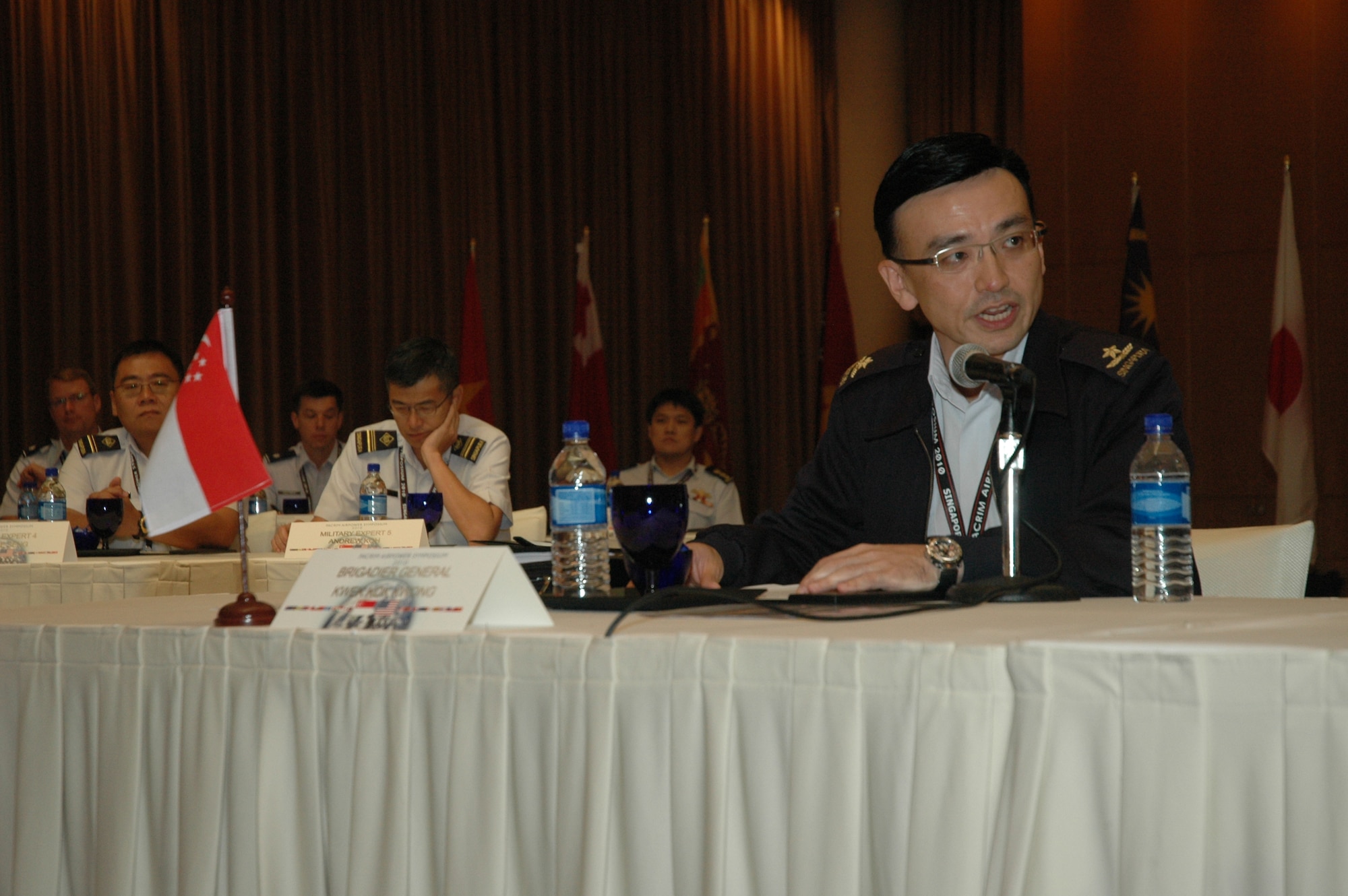 Brig. Gen. Kwek Kok Kwong, Commander of the Air Defence and Operations Command from the Republic of Singapore Air Force, during opening remarks expressed his appreciation for the number of participants and breadth of experience they bring to the 2010 Pacific Rim Airpower Symposium. The annual symposium encourages relationship building and enhances cooperation among the air forces of Asia-Pacific nations. This year's symposium theme, “The Role of Airpower in Peace Support Operations,” aims to help participants from 24 Asia-Pacific nations better understand how air forces can support peace-keeping missions in the region.  (Courtesy photo by Joshua Lok, Singapore Air Force)