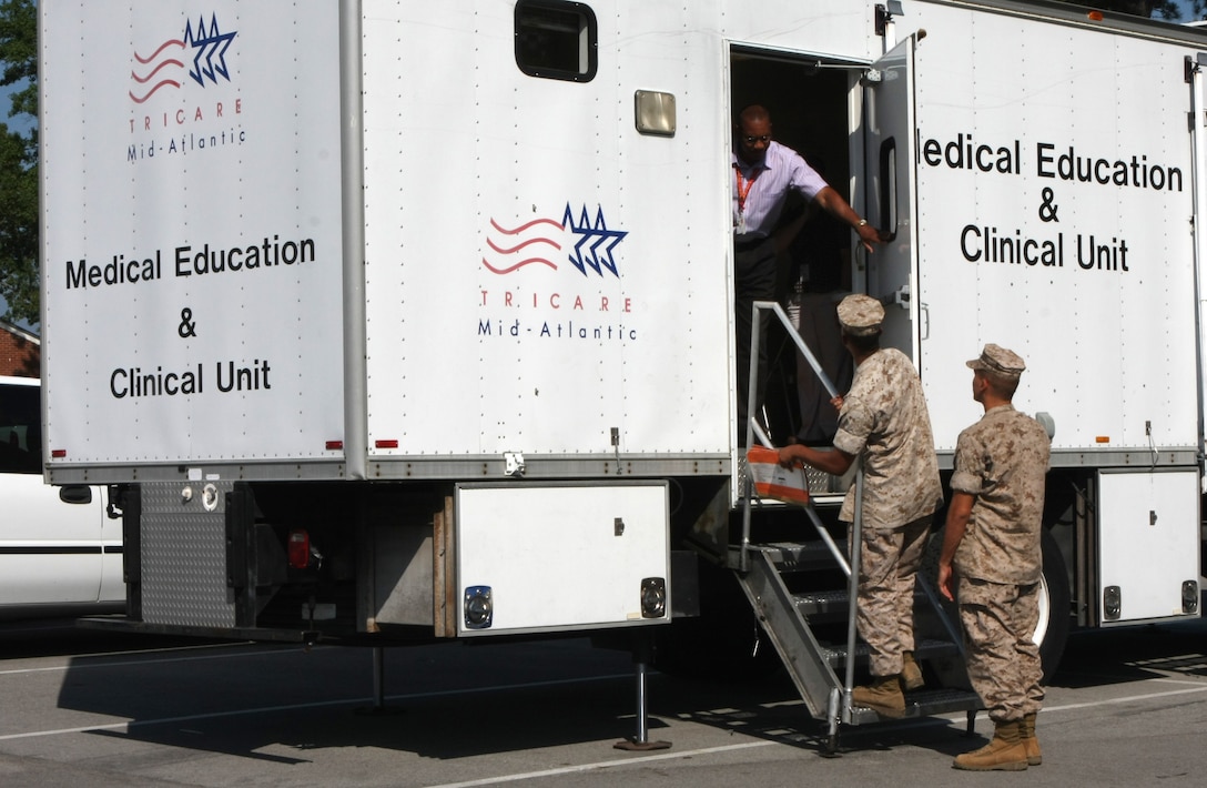 Marines with 3rd Battalion, 2nd Marine Regiment, enter the mobile screening unit from the Deployment Health Center to complete a Post Deployment Health Reassessment survey aboard Camp Lejeune, N.C., July 22, 2010. The infantry battalion was the battalion landing team for 22nd Marine Expeditionary Unit and recently returned from a humanitarian assistance operation in Haiti.  Marines and sailors of 3/2 are now completing their PDHRA after returning from an operational deployment. (Official Marine Corps Photo by Cpl. Justin M. Martinez)