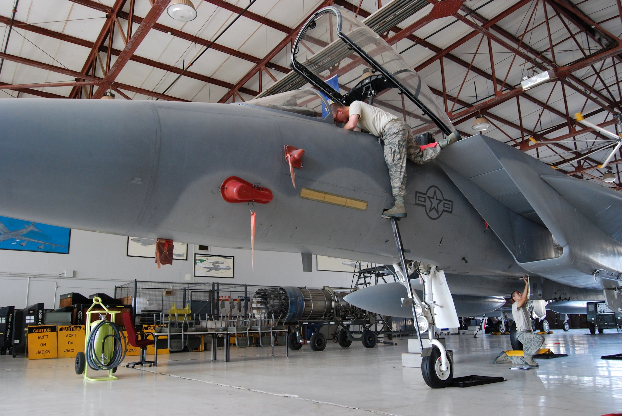 Students in the F-15 Aircraft Maintenance Course at Sheppard Air Force Base, Texas, perform a Safe for Maintenance procedure on an F-15B July 23. Students received hands-on F-15 maintenance training on F-15A and F-15B models and were briefed on the differences between their aircraft and the ones on operational flightlines, F-15C and F-15D.  Sheppard received a total of 13 F-15C and F-15D trainers to replace the older F-15A and F-15B trainers.  (U.S. Air Force photo/Tech. Sgt. Vernon Cunningham)