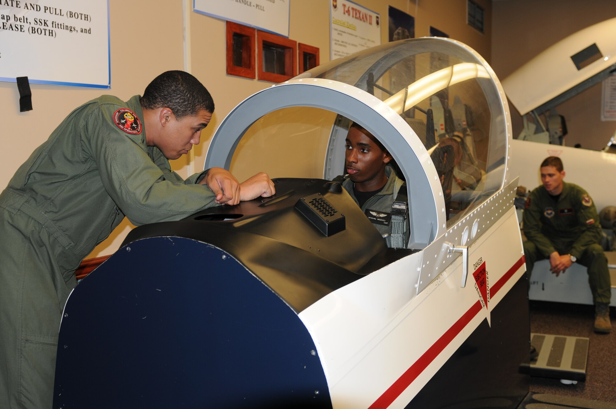 Airman 1st Class Matthew Reeves, an Aerospace Physiology Technician with the 14th Medical Operations Squadron, instructs a Civil Air Patrol cadet in Aerospace and Operational Physiology during the cadet’s visit to Columbus AFB July 12-16. (U.S. Air Force photo/Elizabeth Owens).