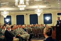 OFFUTT AIR FORCE BASE, Neb. - Col. John Hansen, 55th Operations Group commander, speaks to the crowd during the 55th Intelligence Support Squadron Activation and Assumption of Command ceremony at the Patriot Club July 22. The 55th ISS is part of the 55th OG and will serve as a support function for intelligence operations. U.S. Air Force photo by Charles Haymond