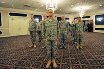 OFFUTT AIR FORCE BASE, Neb. - 55th Operations Group members stand at attention during the 55th Intelligence Support Squadron Activation and Assumption of Command ceremony at the Patriot Club July 22. U.S. Air Force photo by Charles Haymond