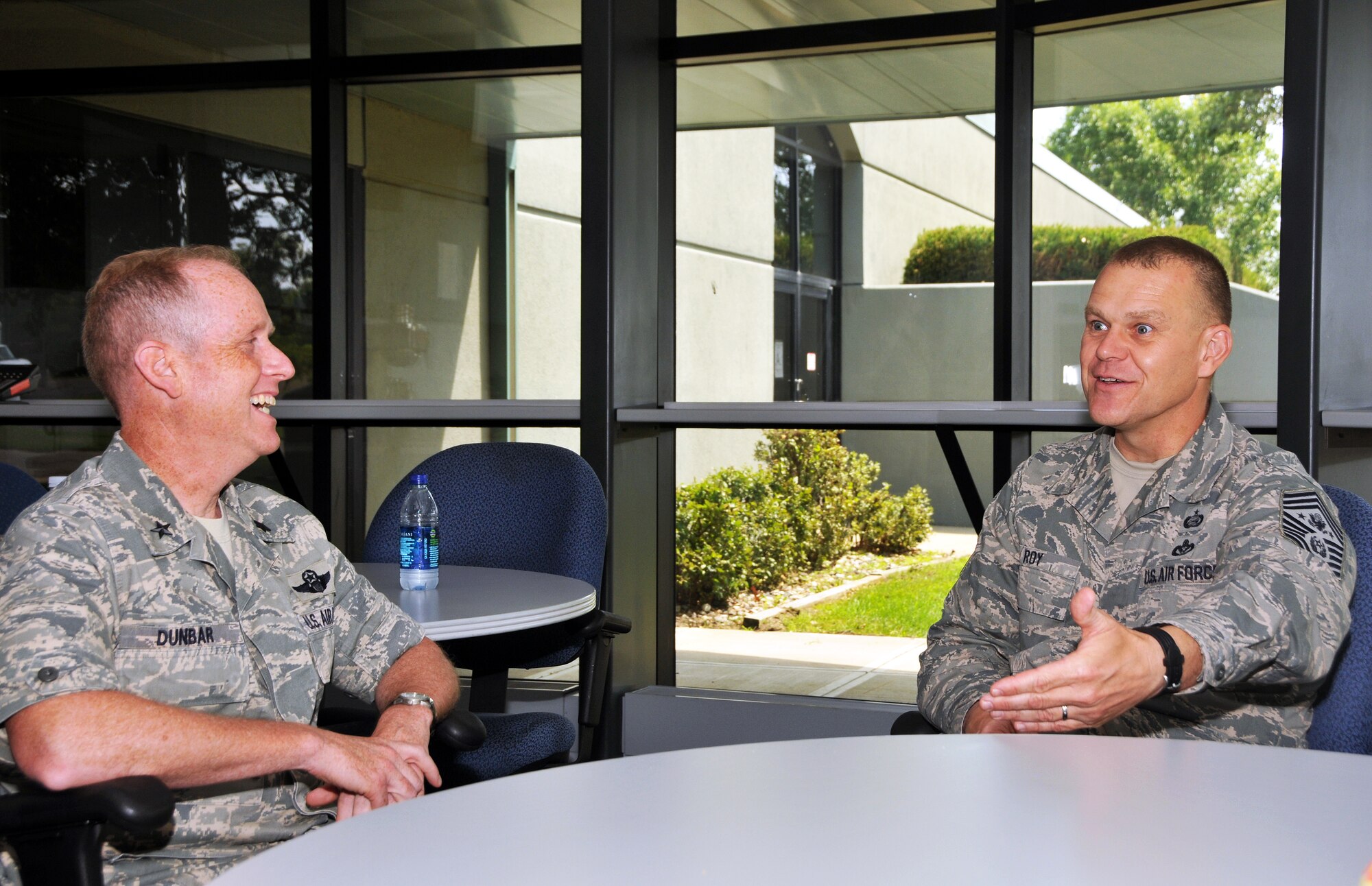Adjutant General for Wisconsin Brig. Gen. Don Dunbar visits with Chief Master Sgt. of the Air Force James A. Roy at the Base Operation Building, Volk Field Air National Guard Base, July 14. Roy accompanied by Air National Guard Command Chief Master Sgt. Christopher Muncy spent two day at Volk Field and nearby Fort McCoy to visit with the enlisted force and observe training at Volk's combat readiness training center. Wisconsin National Guard photo by Tech. Sgt. Jon LaDue 