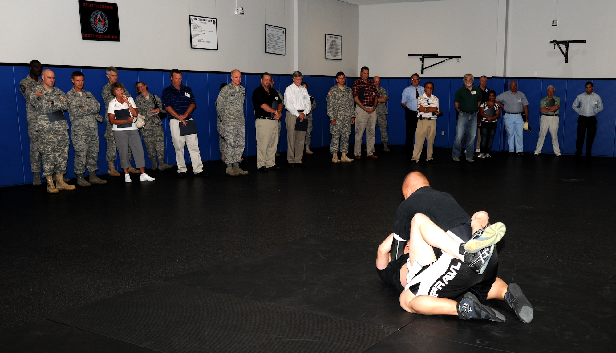 Two Airmen from the 421st Combat Training Squadron demonstrate Raven combatives during the U.S. Air Force Expedtionary Squadron civic leader outreach day, July 21st at Joint Base McGuire-Dix-Lakehurst, N.J. (U.S. Air Force photo by Staff Sgt. Veuril McDavid/Released)