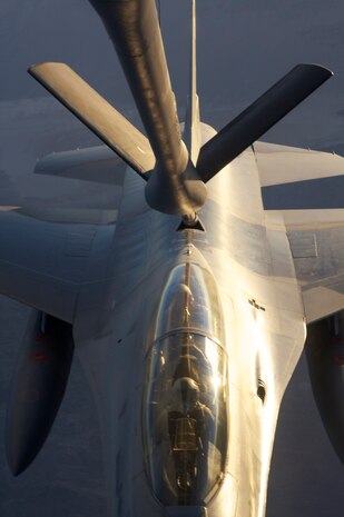 NELLIS AIR FORCE BASE, Nev. -- An F-16 from the Pakistan Air Force receives fuel from a KC-135 during a Red Flag 10-4 mission July 21, 2010.  Red Flag is a realistic combat training exercise involving the air forces of the United States and its allies. The exercise is hosted north of Las Vegas on the Nevada Test and Training Range--the U.S. Air Force's premier military training area with more than 12,000 square miles of airspace and 2.9 million acres of land. With 1,900 possible targets, realistic threat systems and an opposing enemy force that cannot be replicated anywhere else in the world, Nellis and the NTTR are the home of a "peacetime battlefield," providing combat air forces with the ability to train to fly, fight and win together. (U.S. Navy photo by Petty Officer 1st Class Stephen Wolff)
