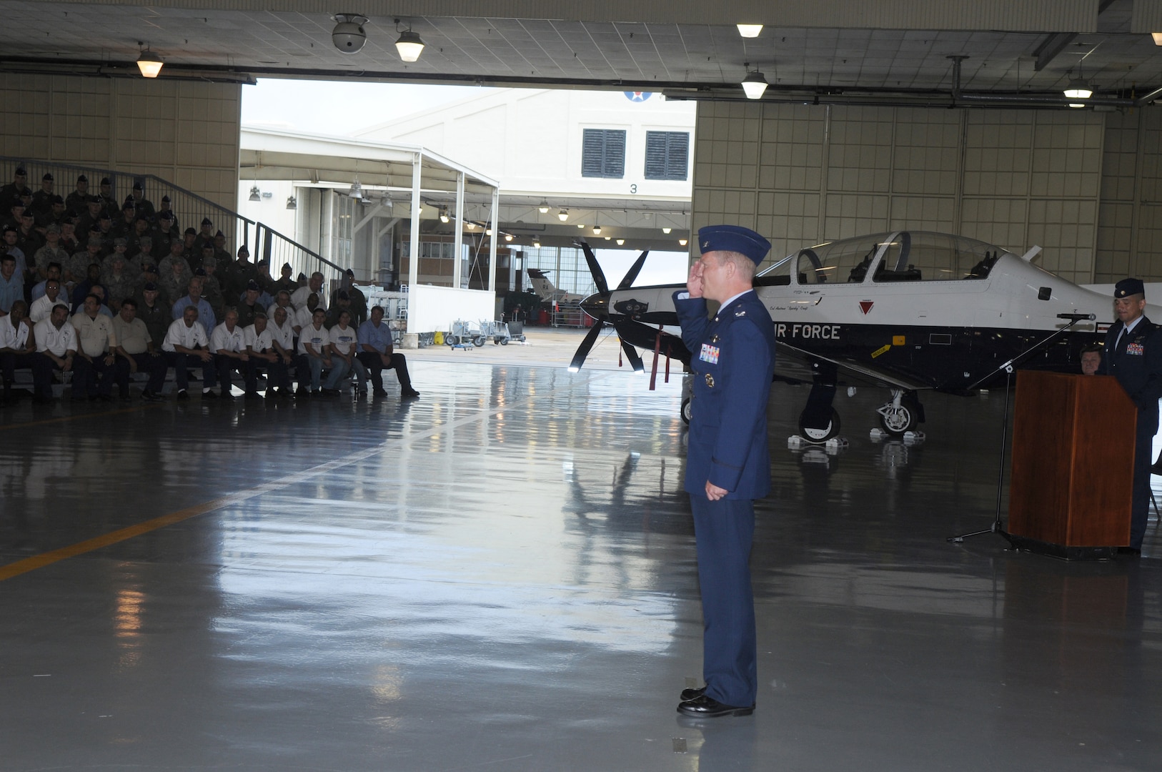 Col. Andrew Croft, 12th Operations Group commander , renders the traditional First Salute at his Assumption of Command ceremony July 23. (U.S. Air Force photo/Rich McFadden)