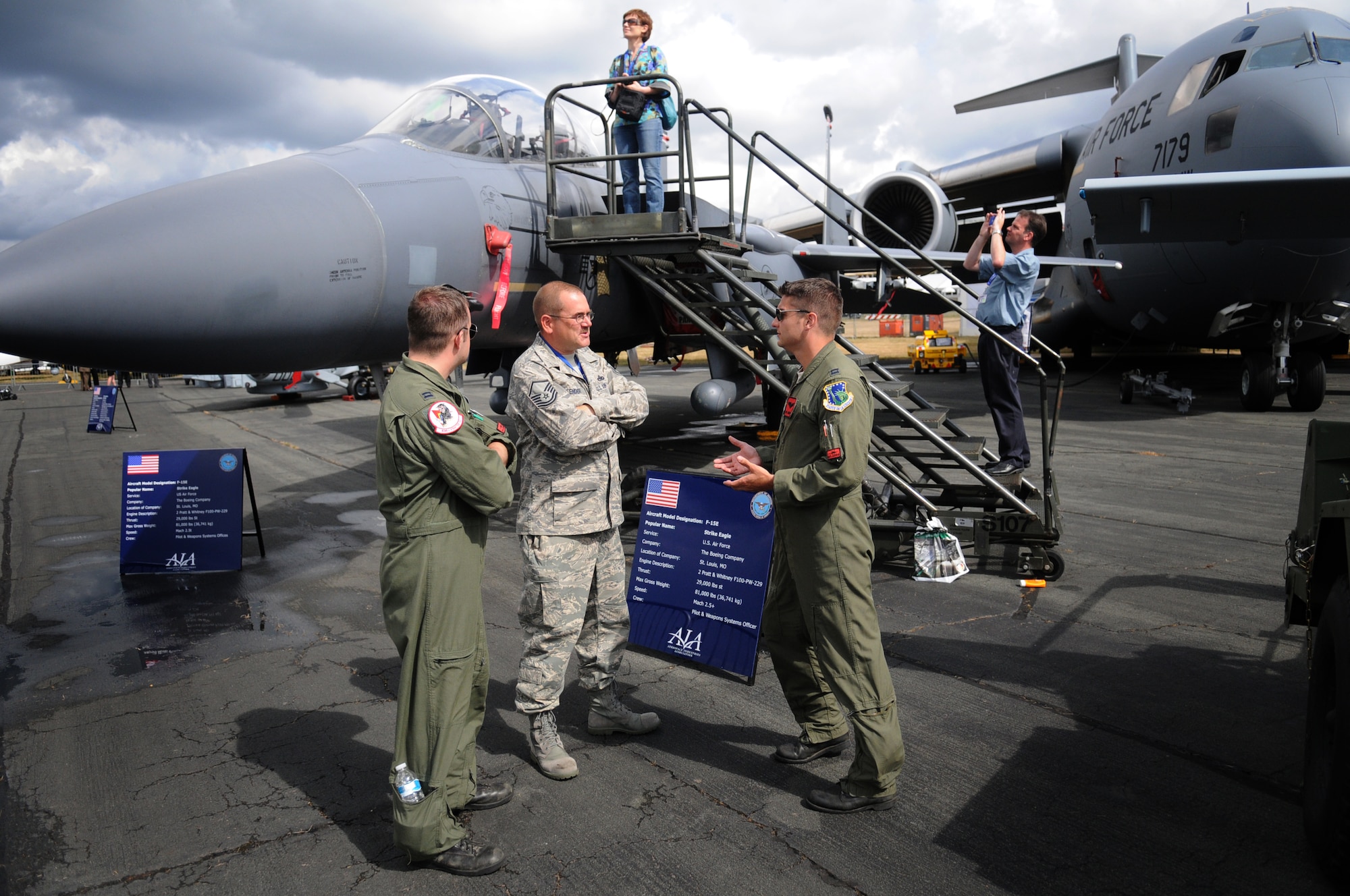 Master Sgt. Brain Pfender of the 48th Maintenance Operations Squadron speaks with the F-15 Strike Eagle pilots at the U.S. corral at the 2010 Farnborough International Air Show. Sergeant Pfender was the maintenance operations supervisor for the U.S. military assets at Farnborough. (U.S. Air Force photo/Staff Sgt. Jerry Fleshman)