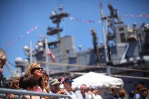 Spectators watch as Marines and Sailors compete in a jousting competition May 30, 2010 during Fleet Week 2010 in New York City.
