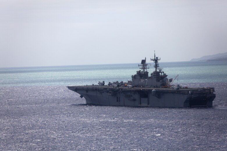 The USS Iwo Jima sits on the Caribbean water off the coast of Port-de-Paix, Haiti, July 24. Military personnel aboard USS Iwo Jima and non-government officials will provide Haiti with humanitarian civic assistance including medical, dental, veterinarian and engineering aid during Operation Continuing Promise 2010.