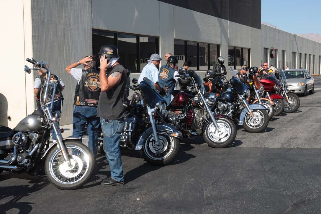Bikers gear up in preparation to begin the Phantom Fury Nomad Motorcycle Club's first Poker Run July 24, in hopes of raising money to build a trike for Staff Sgt. David Lyon, a member of the Wounded Warrior Regiment. Lyon was injured while conducting combat operations in support of Operation Enduring Freedom.