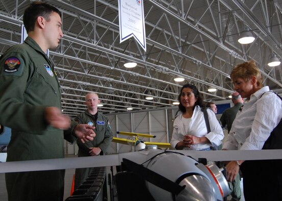 Cadet 1st Class Stephen Pike of Cadet Squadron 21 describes the Air Force Academy's unmanned aerial system airmanship program to Gina Salazar and BJ Barger during the Academy Board of Visitors' tour of the Academy Airfield July 24, 2010. Also pictured is Cadet 2nd Class Travis Potthoff of CS 39. Ms. Salazar, the deputy district director for Rep. Jared Polis (D-Colo.), attended in the congressman's stead. Ms. Barger is the deputy assistant secretary for force management integration at the Pentagon. (U.S. Air Force photo/Staff Sgt. Don Branum)