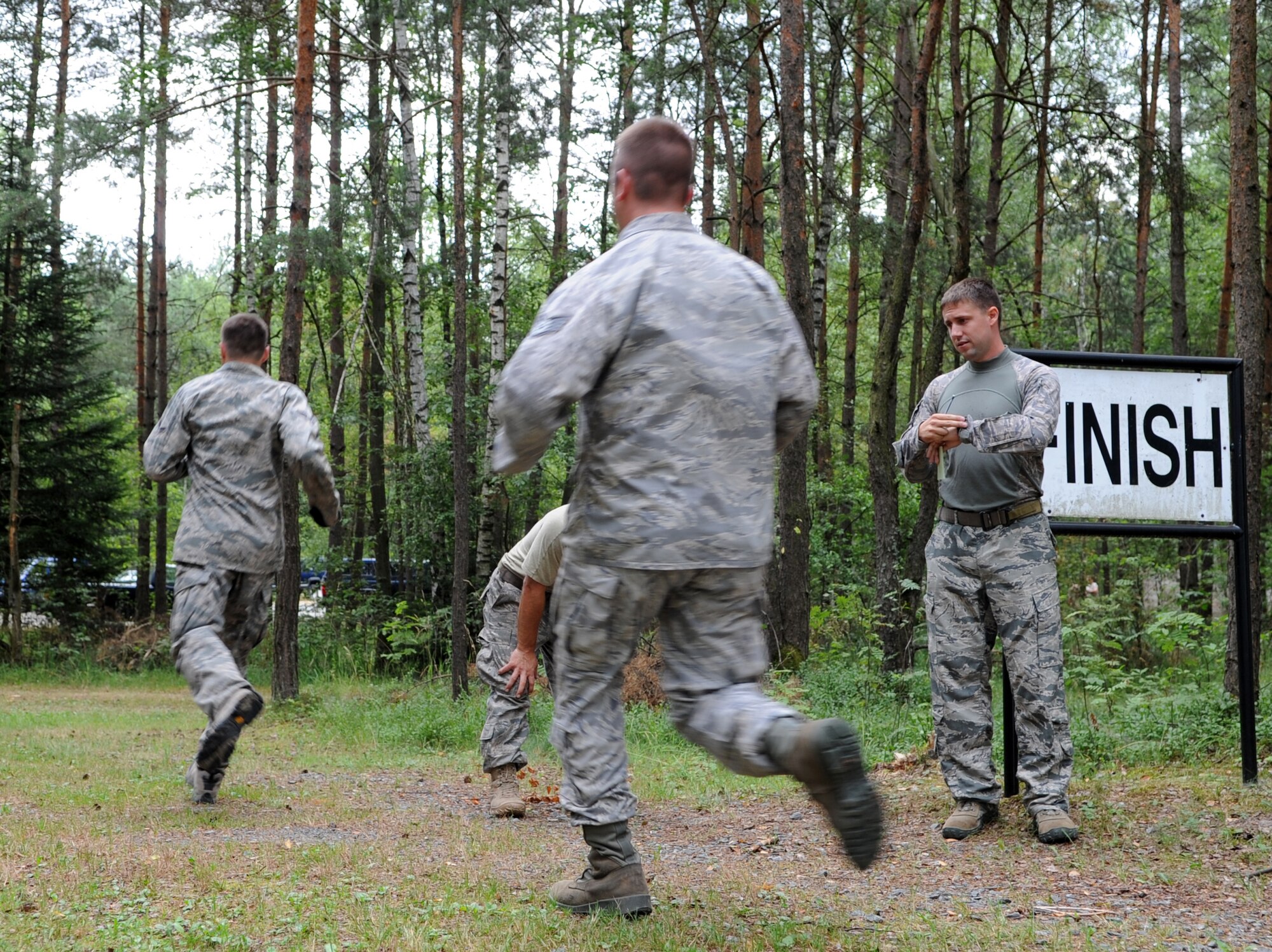 Airmen participants complete an obstacle course during Allied Strike 10, Grafenwoehr, Germany, July 23, 2010. Allied Strike is Europe's premier close air support (CAS) exercise, held annually to conduct robust, realistic CAS training that helps build partnership capacity among allied North Atlantic Treaty Organization nations and joint services while refining the latest operational CAS tactics. For more ALLIED STRIKE information go to www.usafe.af.mil/alliedstrike.asp. (U.S. Air Force photo by Senior Airman Caleb Pierce)