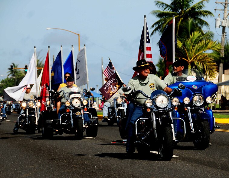 Adelup Point, Guam ? Andersen Air Force Base?s 36th Wing participates in the 66th annual Liberation Day parade along with its sister services and local residents, here on July 21, 2010.  The Liberation Day parade is a celebration of the liberation of the residents of Guam from Japanese control during World War II. (U.S. Air Force photo by Airman 1st Class Jeffrey Schultze)