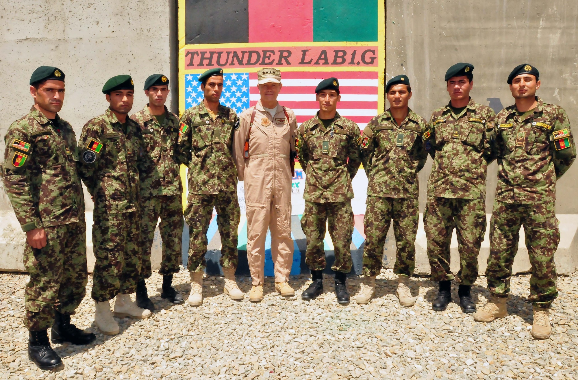 100723-N-6031Q-009 KABUL, Afghanistan - Gen. William M. Fraser III, Commander of the Air Combat Command, visited the Afghan Air Force Base in Kabul on July 23, 2010. Fraser, along with Lt. Gen. Michael Hostage, U.S. Air Forces Central commander, toured the "Thunder Lab", an English immersion program for Afghan pilot candidates. Fraser also toured the living quarters and demonstrated his own pilot skills on the Rotary Wing flight simulator. The visit gave Fraser the opportunity to meet various service members working with the Combined Air Power Transition Force as well as Gen. Darwan, Commanding General of the Afghan Air Force. (US Navy photo by Mass Communication Specialist 2nd Class David Quillen/ RELEASED).