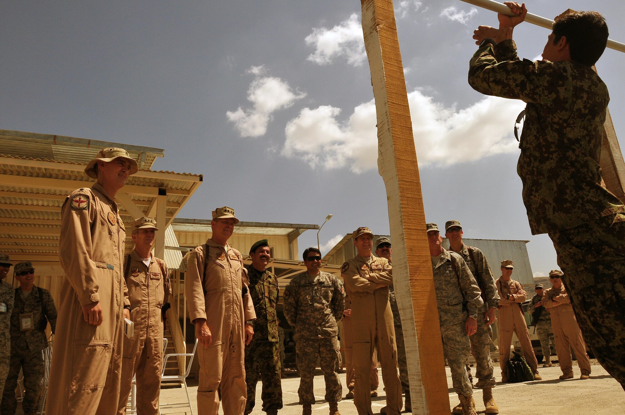 100723-N-6031Q-001 KABUL, Afghanistan - Gen. William M. Fraser III, Commander of the Air Combat Command, center,watches a pull-up challenge when he visited the Afghan Air Force Base in Kabul on July 23, 2010. Fraser, along with Lt. Gen. Michael Hostage, U.S. Air Forces Central commander, toured the "Thunder Lab", an English immersion program for Afghan pilot candidates. Fraser also toured the living quarters and demonstrated his own pilot skills on the Rotary Wing flight simulator. The visit gave Fraser the opportunity to meet various service members working with the Combined Air Power Transition Force as well as Gen. Darwan, Commanding General of the Afghan Air Force. (US Navy photo by Mass Communication Specialist 2nd Class David Quillen/ RELEASED).