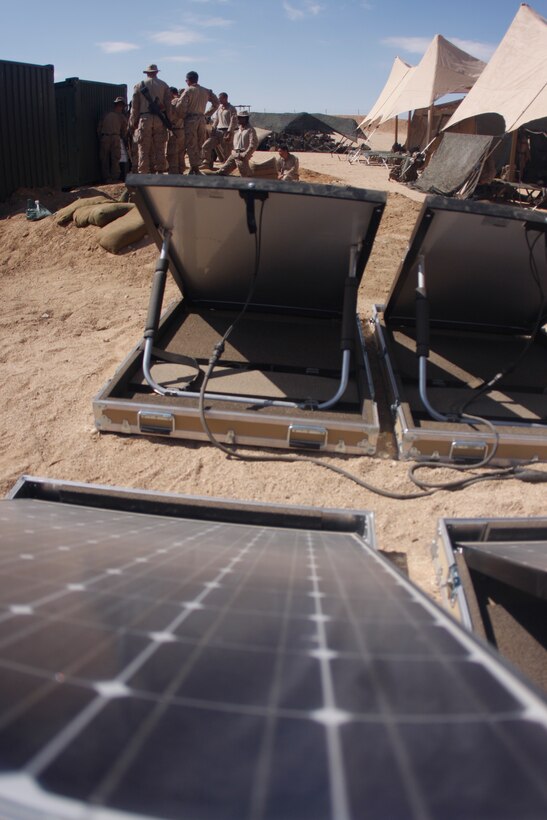 MARINE CORPS AIR GROUND COMBAT CENTER TWENTYNINE PALMS, Calif. – Solar panels soak up rays and convert it to electricity at Combat Center Range 220 July 26. The panels are being utilized by 3rd Battalion, 5th Marine Regiment, based out of Marine Corps Base Camp Pendleton, Calif., to power radios, laptop computers, lighting, ventilation and other systems.