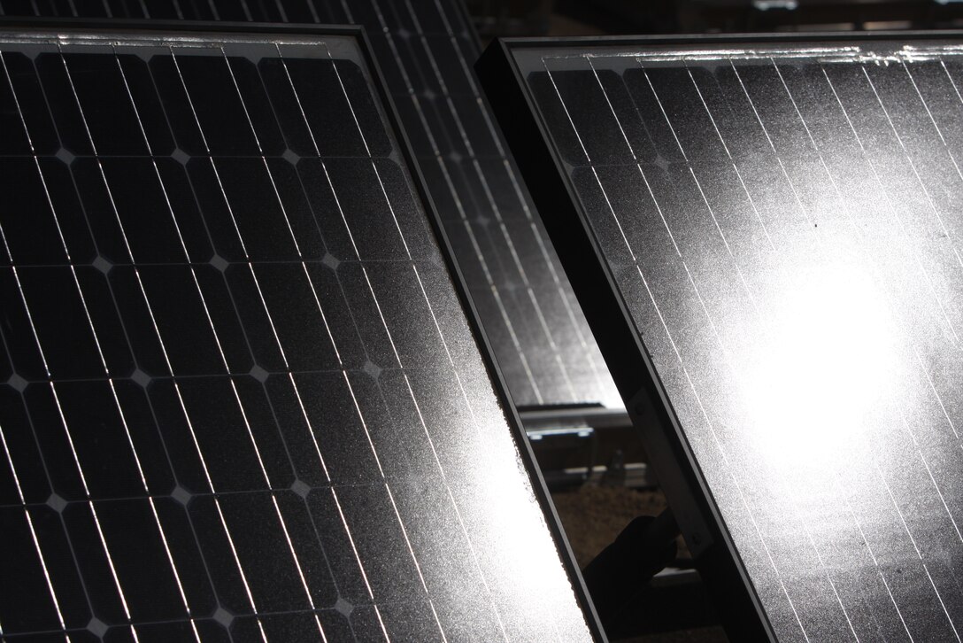 MARINE CORPS AIR GROUND COMBAT CENTER TWENTYNINE PALMS, Calif. – Solar Panels soak up the sun’s rays and convert it to electric power during an Experimental Forward Operating Base exercise at the Combat Center being conducted by Third Battalion, 5th Marine Regiment, based out of Marine Corps Base Camp Pendleton, Calif. The Marines from 3rd Bn., 5th Marines are the first military unit to use nothing but renewable energy to power their systems as they take part in Enhanced Mojave Viper, a month-long, combined arms live fire pre-deployment exercise in the Mojave Desert. After testing is complete, the battalion is scheduled to deploy with this equipment to Afghanistan in the fall.