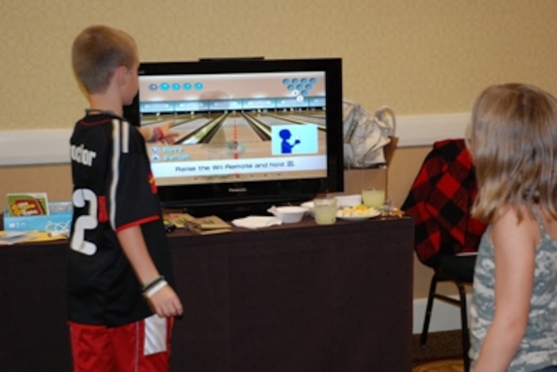 Kids are engaged in entertaining games geared toward their age group while their parents attend the Yellow Ribbon Reintegration Program, July 23-25, in Gatlinburg, Tenn.  (U.S. Air Force photo/J.D. Marckmann)