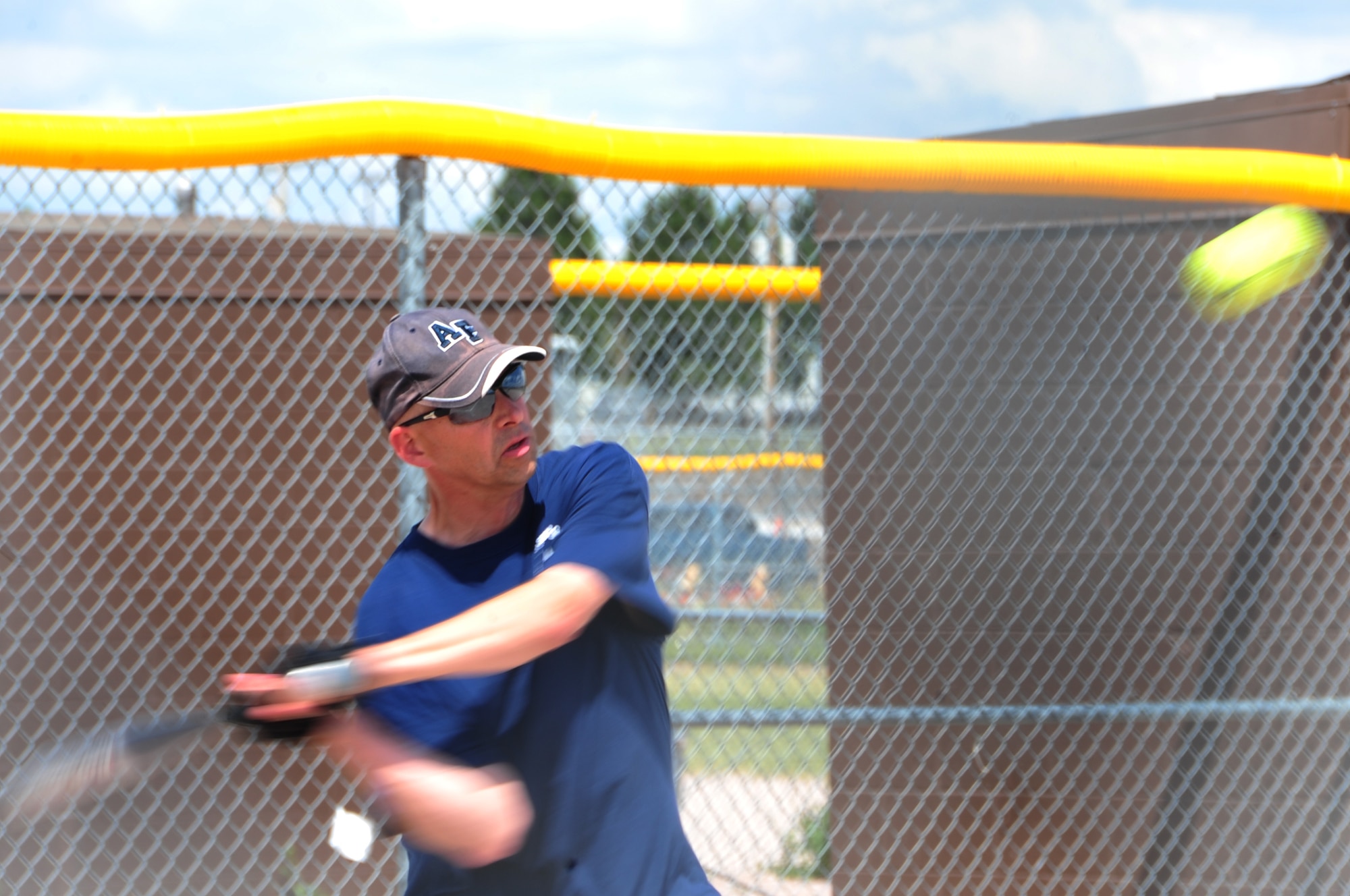 ELLSWORTH AIR FORCE BASE, S.D. -- Master Sgt. David Wells, 28th Munitions Squadron first sergeant, swings at a softball during the annual Chiefs vs. Eagles game, July 23.  The softball game is played during the annual base picnic, and this year the Chiefs won against the Eagles 32 to 12. (U.S. Air Force photo/Airman 1st Class Anthony Sanchelli)