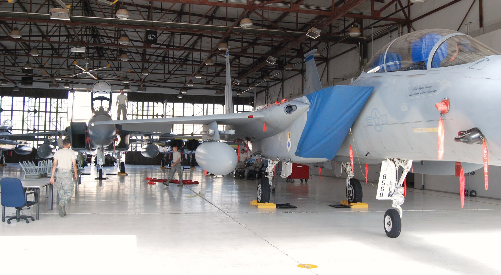 An F-15D Eagle (front) is parked in a training hangar July 23, 2010, at Sheppard Air Force Base, Texas, to be used for training F-15 aircraft maintenance students on the latest equipment and controls of an F-15 jet. (U.S. Air Force photo/Tech. Sgt. Vernon Cunningham)