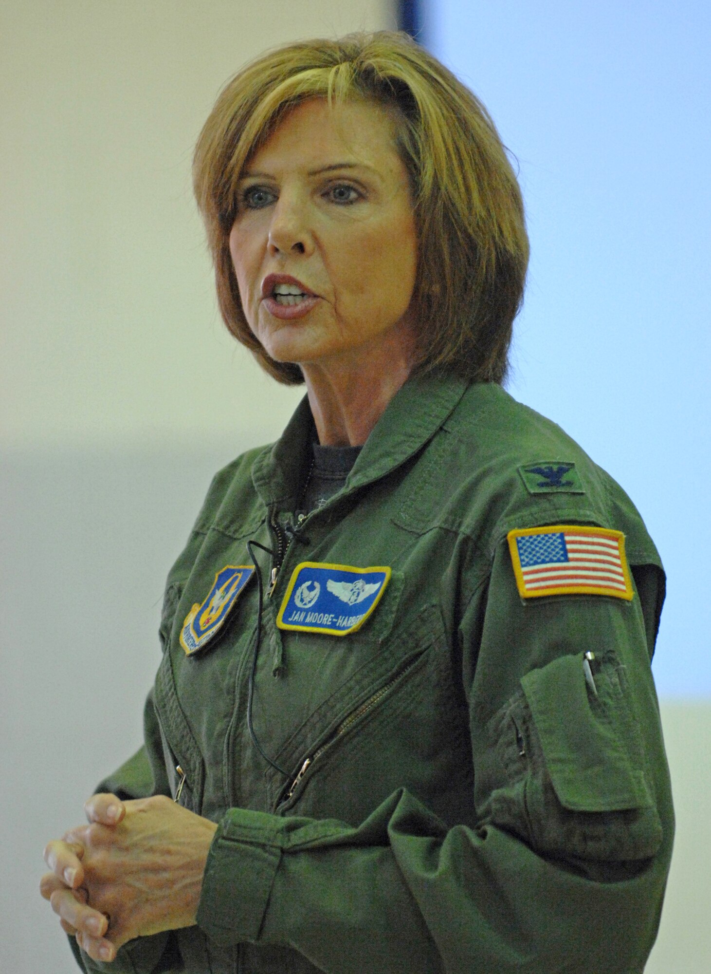 BUSH FIELD, Augusta, Ga. - Col. Jan Moore-Harbert, commander of the 446th Aeromedical Evacuation Squadron, McChord Field, speaks to exercise participants during Global Medic 2010 exercise, July 15. Global Medic is a joint field training exercise for theater aeromedical evacuation system and ground medical components designed to replicate all aspects of combat medical service support. (U.S. Air Force photo/Staff Sgt. Donald R. Allen)