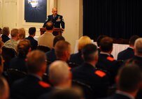 OFFUTT AIR FORCE BASE, Neb. - Chief Master Sgt. Stephan L. Dolecki, 55th Operations Group superintendent, provides opening remarks at the Senior Noncommissioned Officer Induction Ceremony at the Patriot Club July 23.  his tier of the enlisted force structure consists of the top three enlisted ranks. SNCO's use their experinece and leadership ability to leverage resources and personnel against a variety of missions and further develop their teams and people, both technically and professionally. U.S. Air Force photo by Josh Plueger