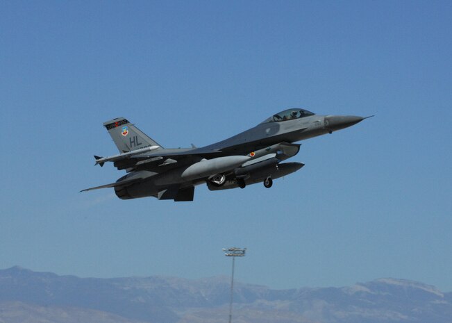 NELLIS AIR fORCE BASE, Nev. -- An F-16 from the 4th Fighter Squadron, Hill Air Force Base, Utah takes off the runway for Green Flag here July 21, 2010.The 4th FS trained with the U.S. Army in realistic air-land integration scenarios at the National Training Center, Fort Irwin, Calif., July 11-23 in preparation for upcoming deployment to Afghanistan in in support of counter-insurgency operations. (U.S. Air Force photo by Airman 1st Class Daniel Phelps)
