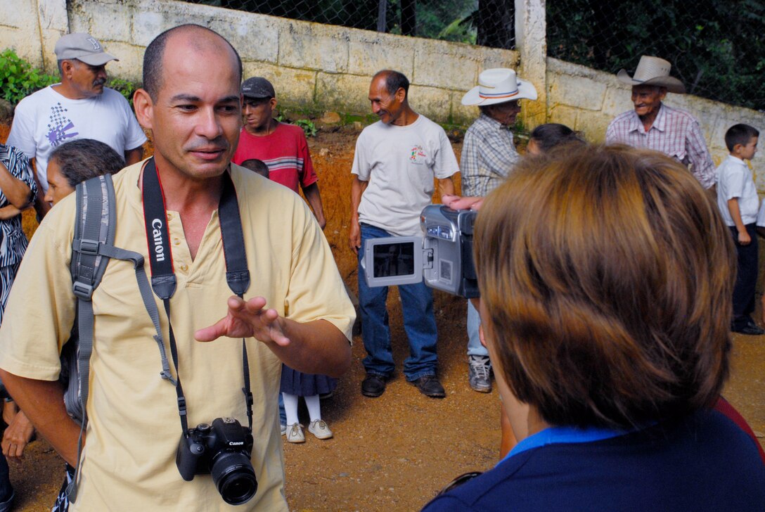 EL ROBLITO, Honduras --  During an interview with a local news station, Staff Sgt. Luis Diaz, of Joint Task Force-Bravo, explains why U.S. military members work with local leaders to deliver supplies to villages in need during the Chapel Hike here July 16. According to the JTF-Bravo chaplain's office, the monthly hikes build and foster positive relationships with the Honduran people and strength JTF-Bravo’s commitment to the Honduran government to provide humanitarian assistance. (U.S. Air Force photo/Tech. Sgt. Benjamin Rojek)
