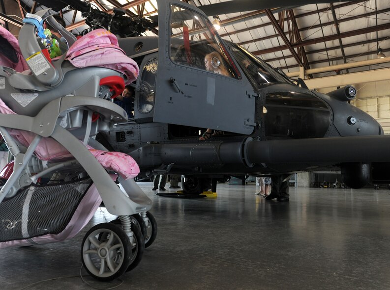 MOODY AIR FORCE BASE, Ga. -- Military family members had the chance to come on base to view static aircraft displays and emergency vehicles used by different squadrons on Moody here July 23. They were allowed to tour an HC-130P/N Combat King, HH-60G Pave Hawk and A-10C Thunderbolt II along with other vehicles used by Moody personnel. (U.S. Air Force photo by Airman 1st Class Benjamin Wiseman/RELEASED)