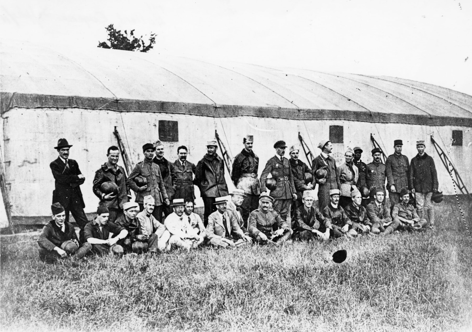 Eugene Bullard -- his Croix de Guerre clearly visible and a flying helmet in his hand -- poses with other student pilots at Avord, France. (U.S. Air Force photo)