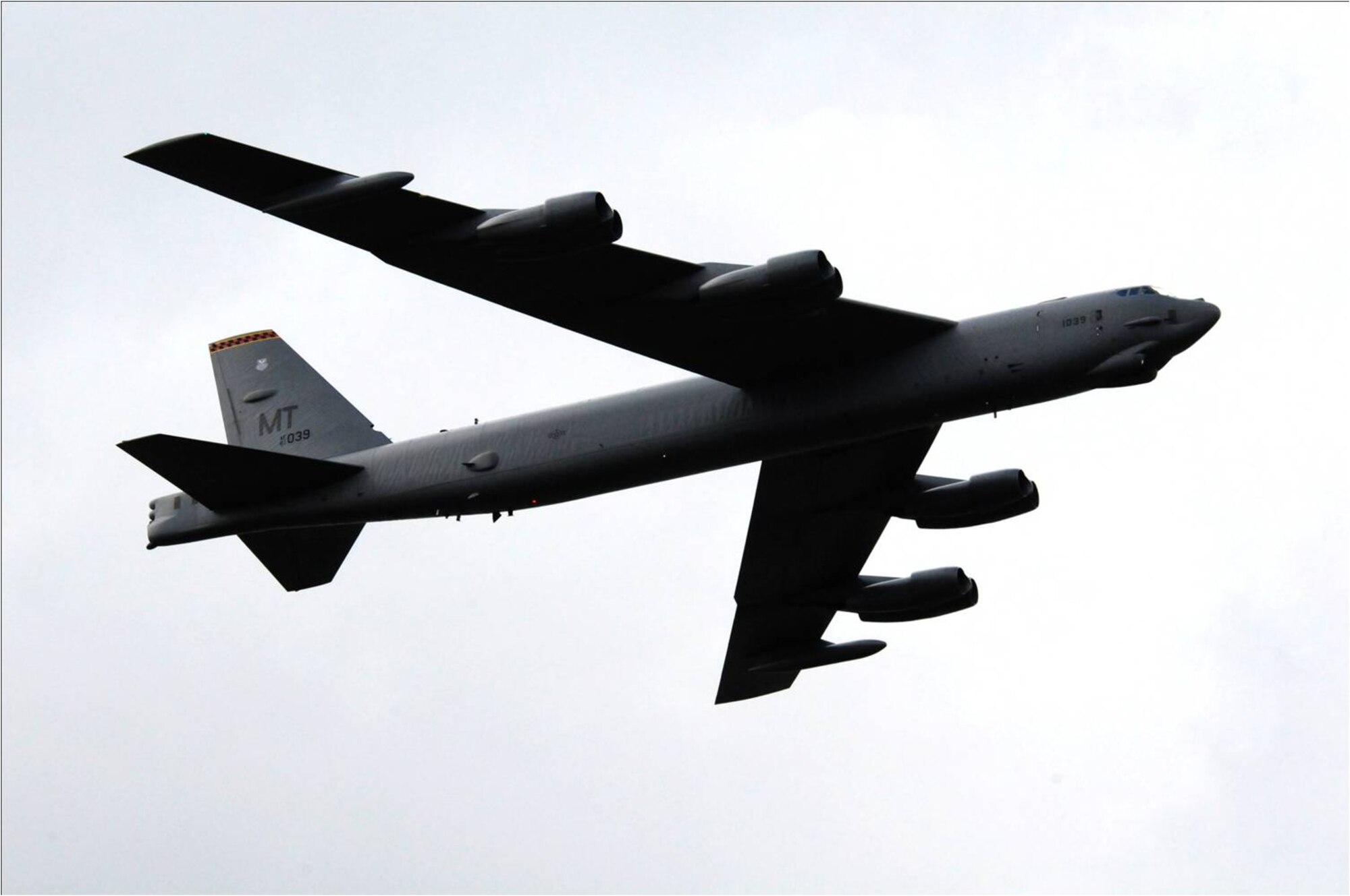 FARNBOROUGH, United Kingdom -- A B-52H Stratofortress from the 5th Bomb Wing, Minot Air Force Base, N.D., performs a flyover at the 2010 Farnborough International Air Show July 22.  The aircraft was one of 11 U.S. military assets either on static display or performing aerial demonstrations for approximately 285,000 spectators at the week-long event. (U.S. Air Force photo by Staff Sgt. Heather M. Norris)