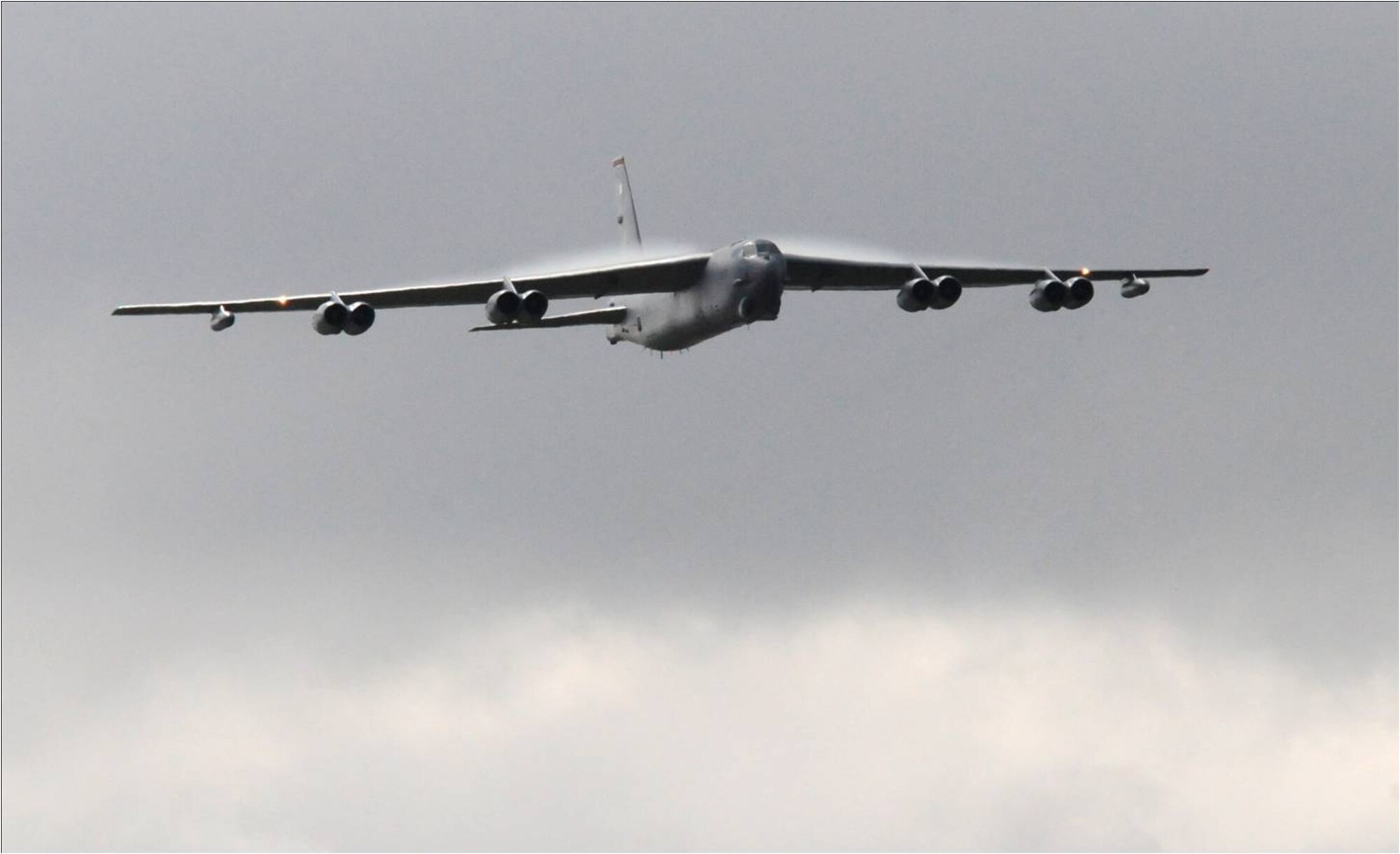 FARNBOROUGH, United Kingdom -- A B-52H Stratofortress from the 5th Bomb Wing, Minot Air Force Base, N.D., performs a flyover at the 2010 Farnborough International Air Show July 22.  The aircraft was one of 11 U.S. military assets either on static display or performing aerial demonstrations for approximately 285,000 spectators at the week-long event. (U.S. Air Force photo by Staff Sgt. Heather M. Norris)