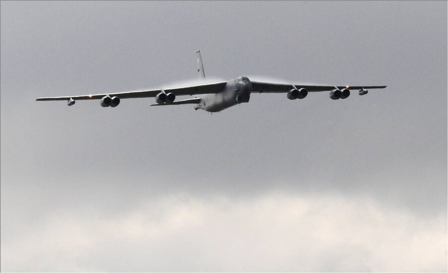 FARNBOROUGH, United Kingdom -- A B-52H Stratofortress from the 5th Bomb Wing, Minot Air Force Base, N.D., performs a flyover at the 2010 Farnborough International Air Show July 22.  The aircraft was one of 11 U.S. military assets either on static display or performing aerial demonstrations for approximately 285,000 spectators at the week-long event. (U.S. Air Force photo by Staff Sgt. Heather M. Norris)