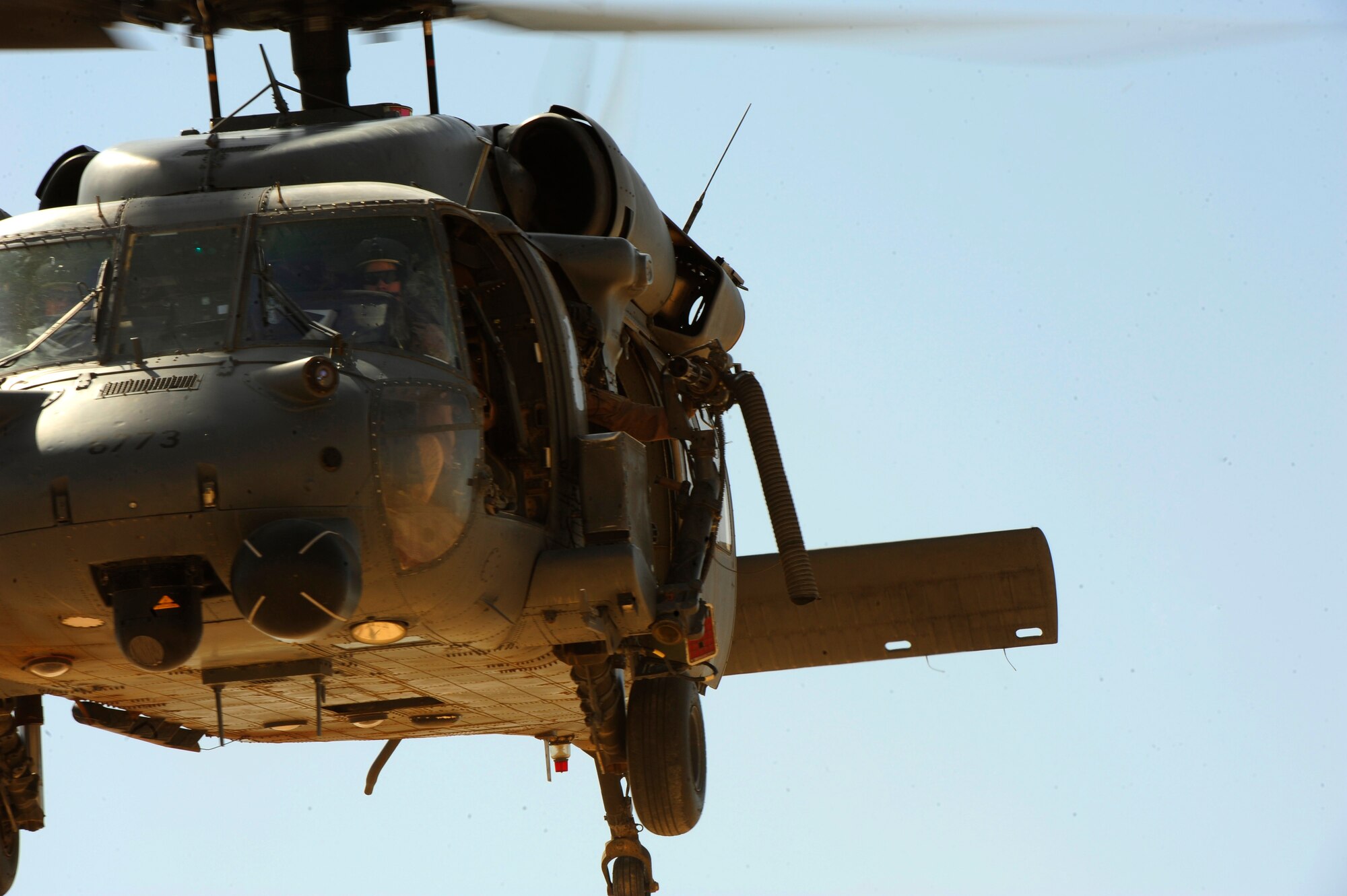 A U.S. Air Force HH-60G PaveHawk helicopter assigned to the 64th Expeditionary Rescue Squadron makes an approach over the landing zone, performing combat landings and take-offs during a flying mission at Joint Base Balad, Iraq, July 12, 2010. (U.S. Air Force photo by Staff Sgt. Andy M. Kin / Released)