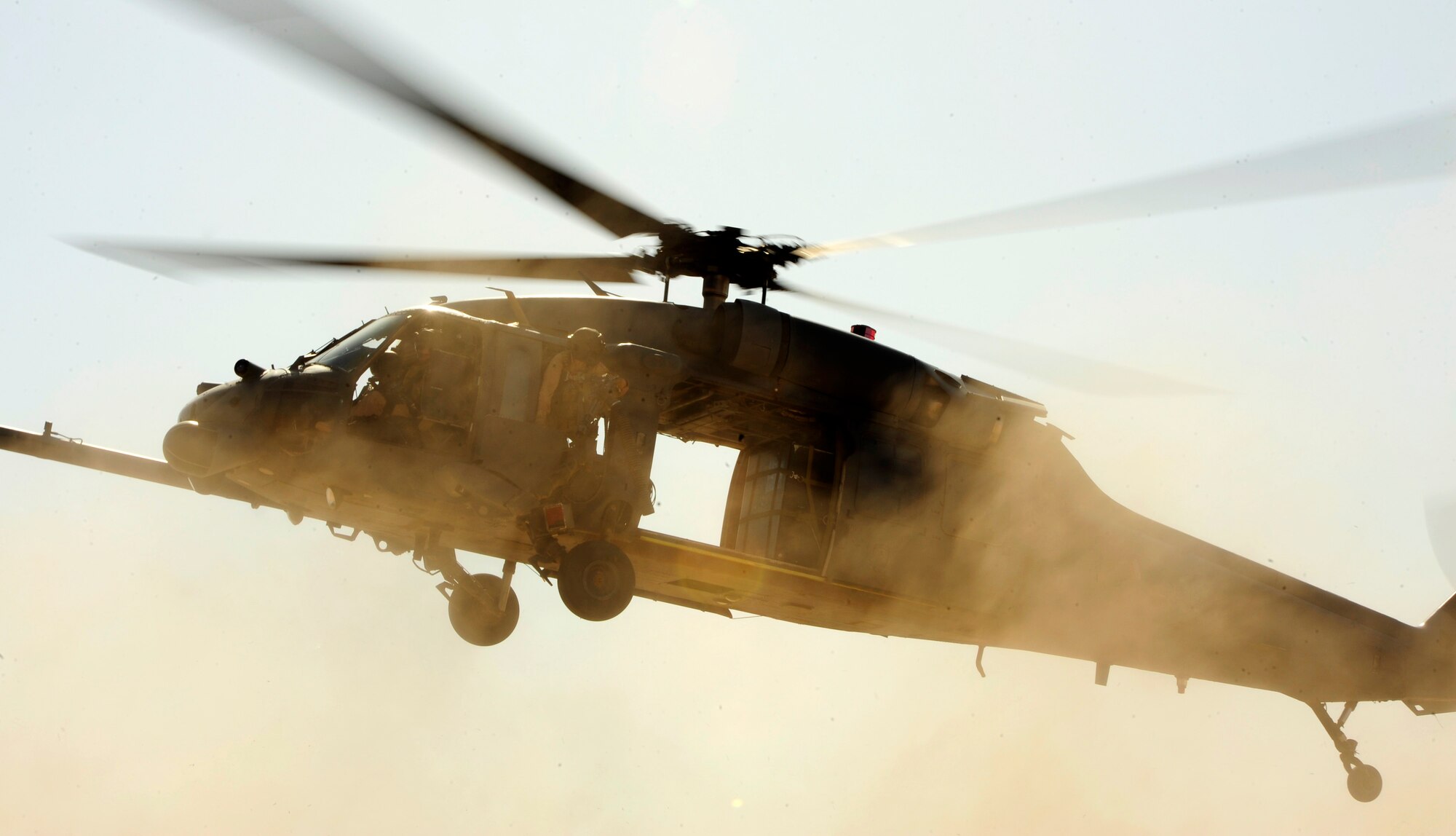 A U.S. Air Force HH-60G PaveHawk helicopter assigned to the 64th Expeditionary Rescue Squadron comes down for a landing during a flying mission at Joint Base Balad, Iraq, July 12, 2010. (U.S. Air Force photo by Staff Sgt. Andy M. Kin / Released)