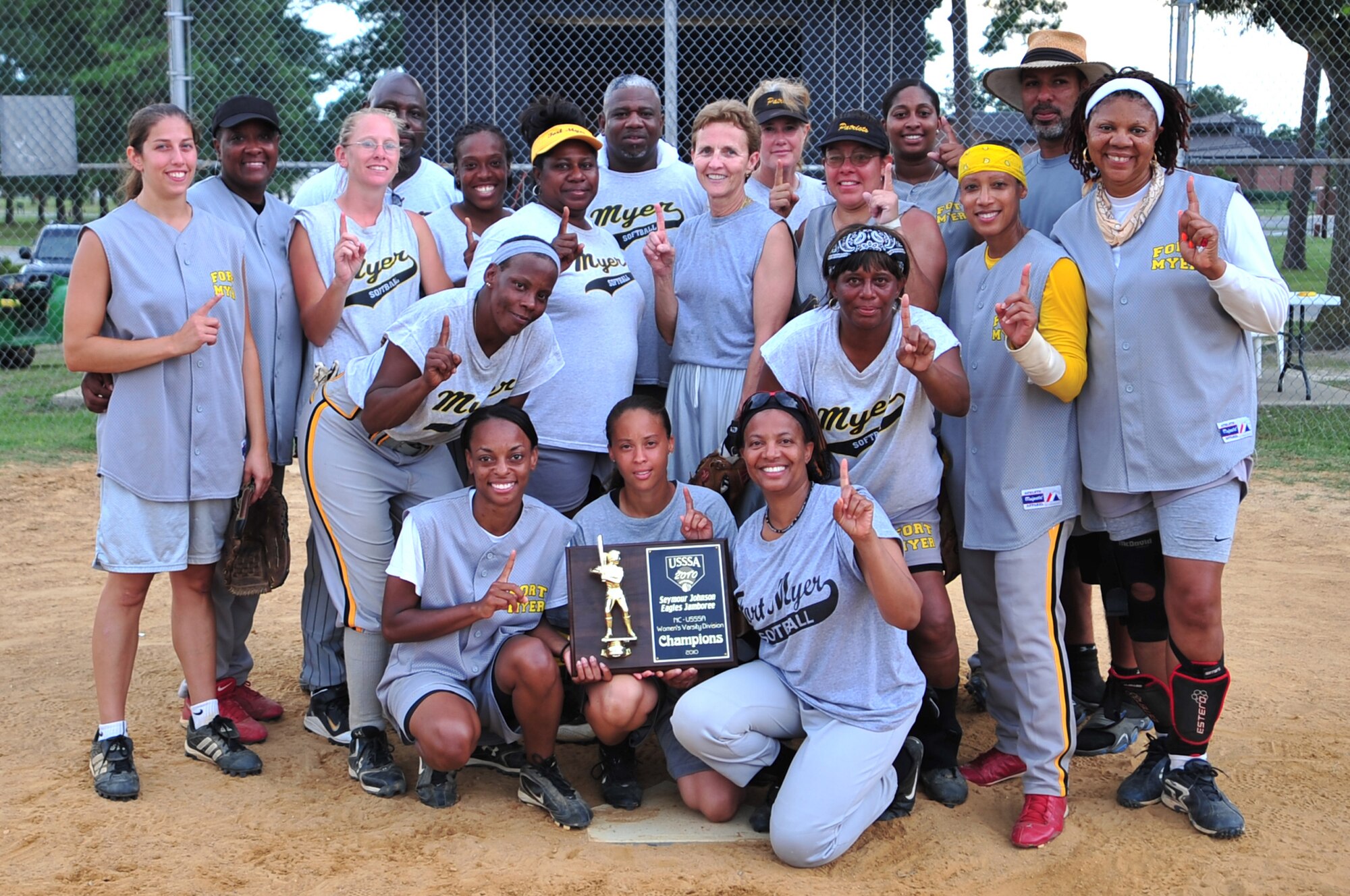 SEYMOUR JOHNSON AIR FORCE BASE, N.C. -- Joint Base Myer-Henderson Hall's "Lady Generals" and their coaches pose with the Eagles Grand Slam Jamboree Softball Championship trophy here, July 18, 2010. The "Lady Generals" traveled from Joint Base Myer-Henderson Hall, Va., to beat-out five other teams and win the championship series. (U.S. Air Force photo/Senior Airman Rae Perry)
