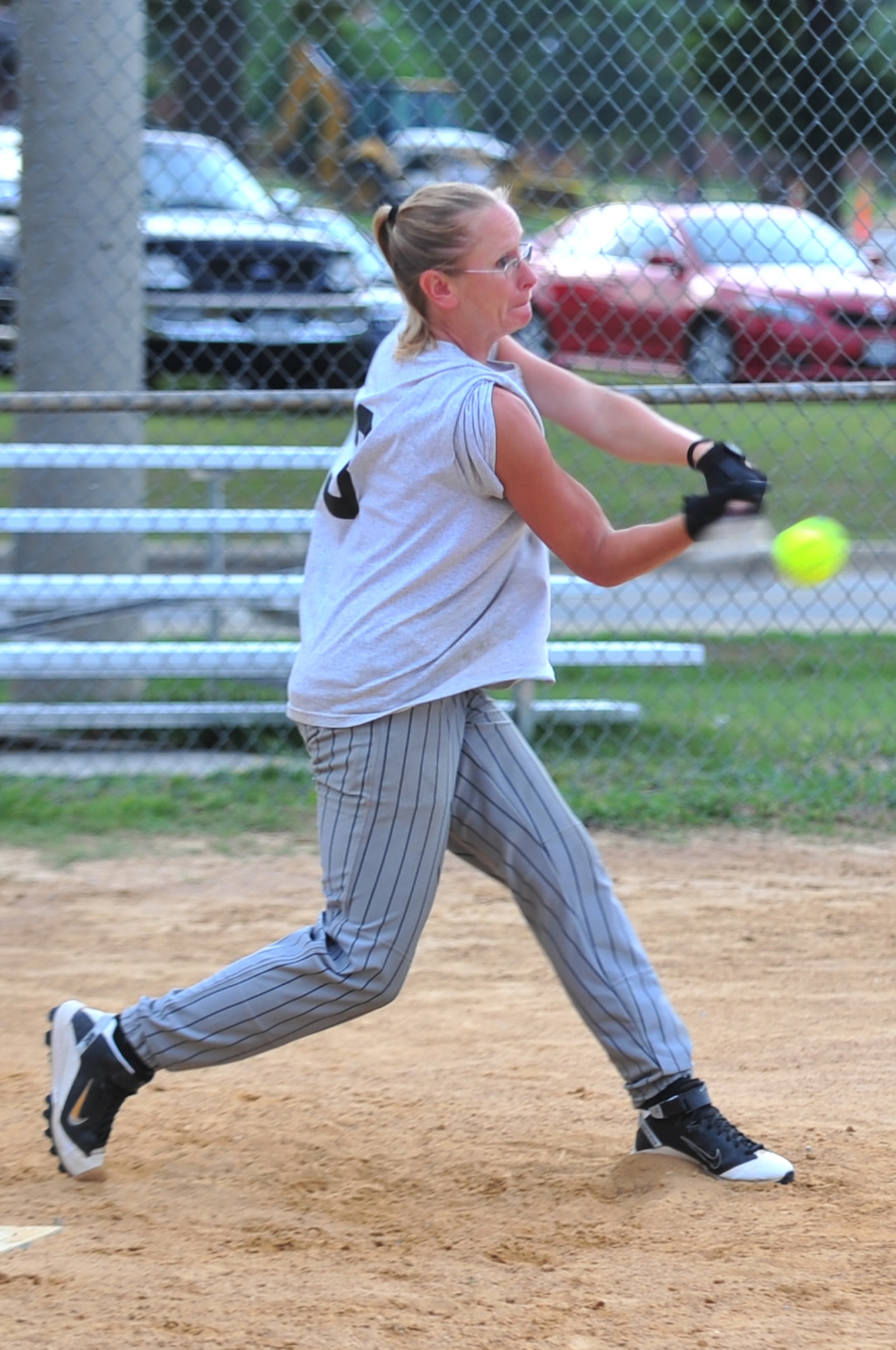 SEYMOUR JOHNSON AIR FORCE BASE, N.C. ? Joyce Brewer hits the ball during the Eagles Grand Slam Jamboree Softball Championship here, July 18, 2010. Six teams competed for the trophy, bragging rights and $100. Brewer is the Joint Base Myer-Henderson Hall ?Lady Generals? left center fielder. She hails from Woodridge, Va. (U.S. Air Force photo/Senior Airman Rae Perry)