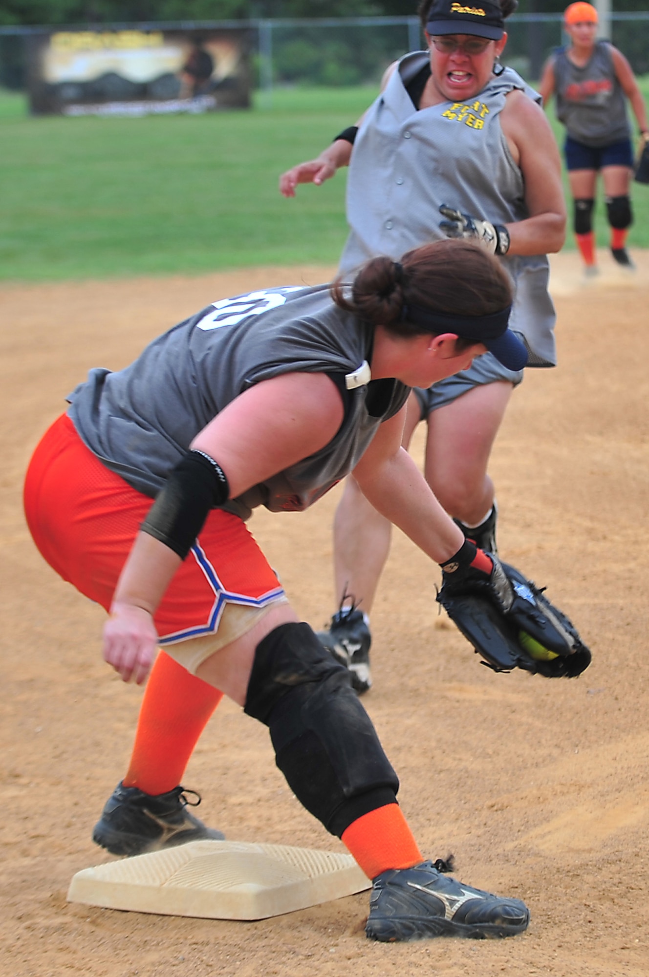 SEYMOUR JOHNSON AIR FORCE BASE, N.C. -- "All Kinds" third baseman Julie Wells forces an out during the Eagles Grand Slam Jamboree Softball Championship here, July 18, 2010. "All Kinds" from Fort Belvoir, Va., played against Joint Base Myer-Henderson Hall, Va., in the championship game. The final score was 7-3, JBMYHH walking away with the victory. Wells hails from Lake Ridge, Va. (U.S. Air Force photo/Senior Airman Rae Perry)